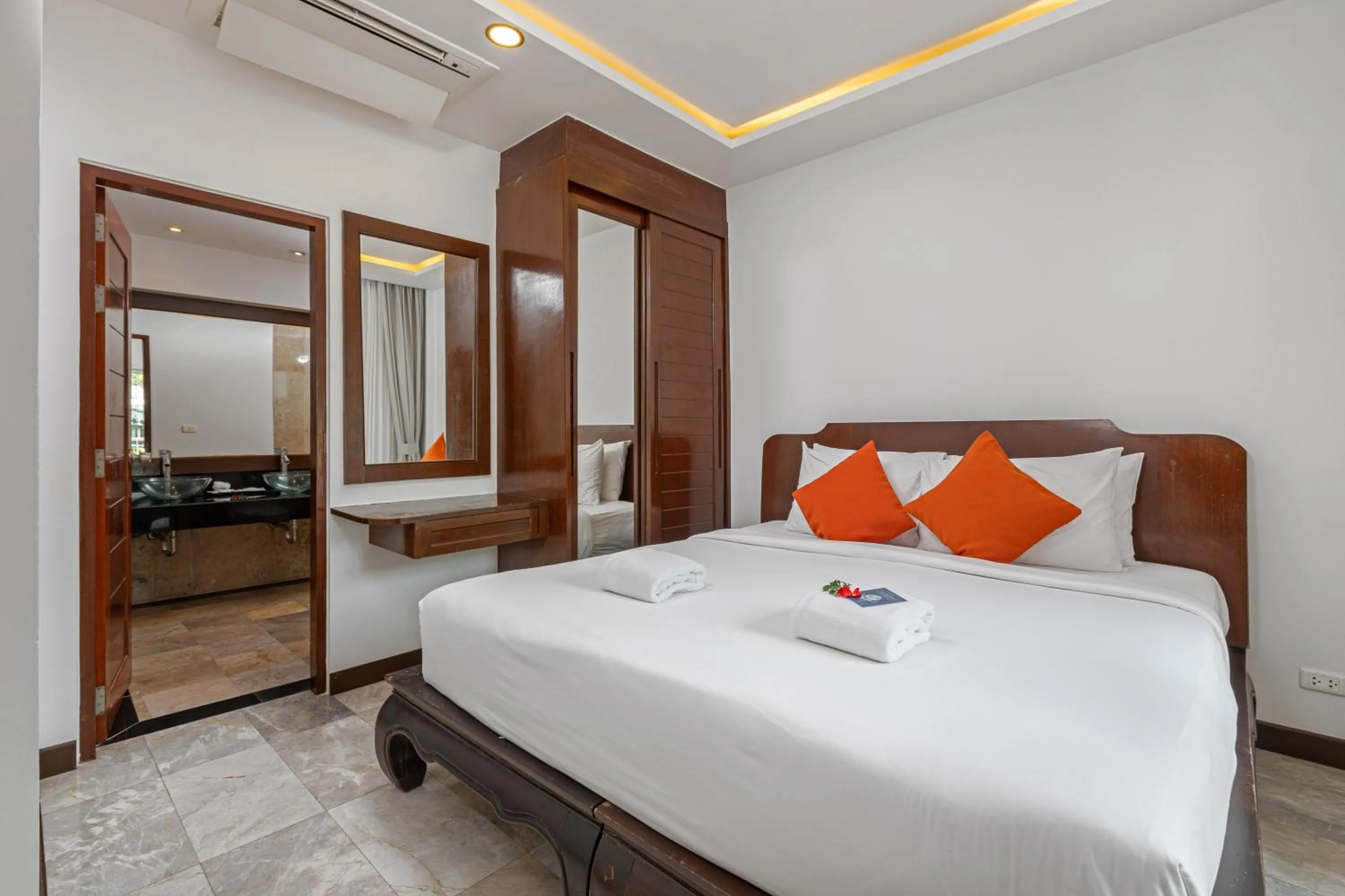 Bed in Phunawa Resort Phuket Karon Beach - SHA Plus