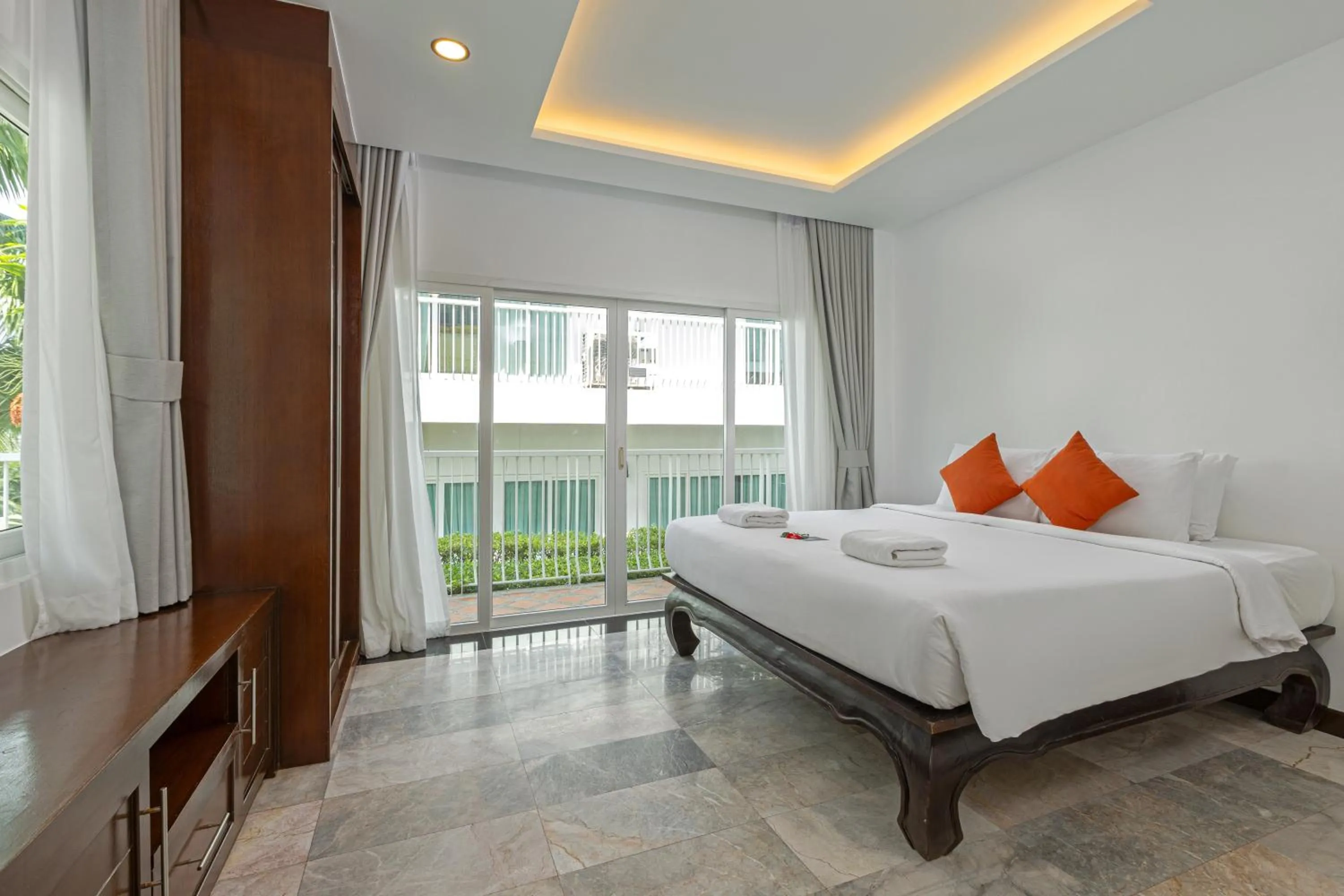 Bed in Phunawa Resort Phuket Karon Beach - SHA Plus