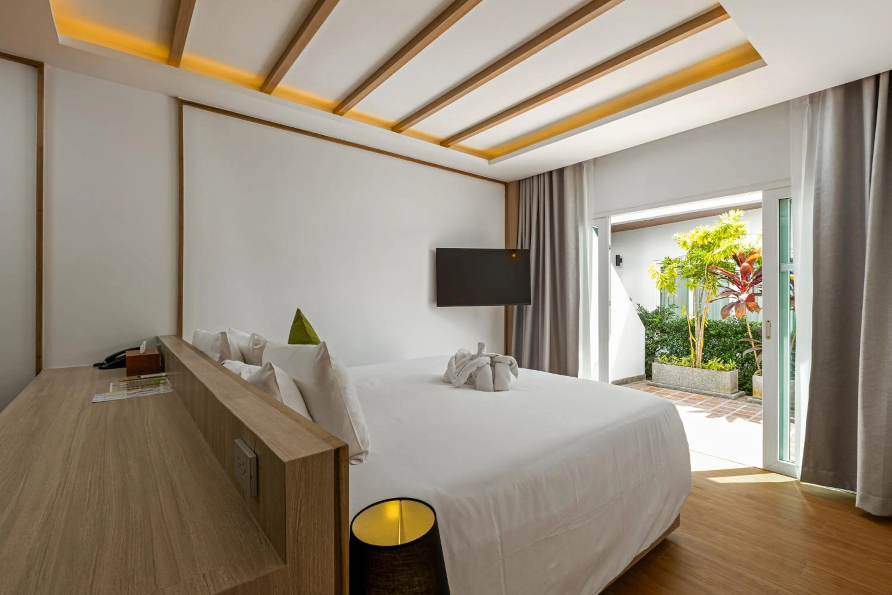Bedroom, Bed in Phunawa Resort Phuket Karon Beach - SHA Plus