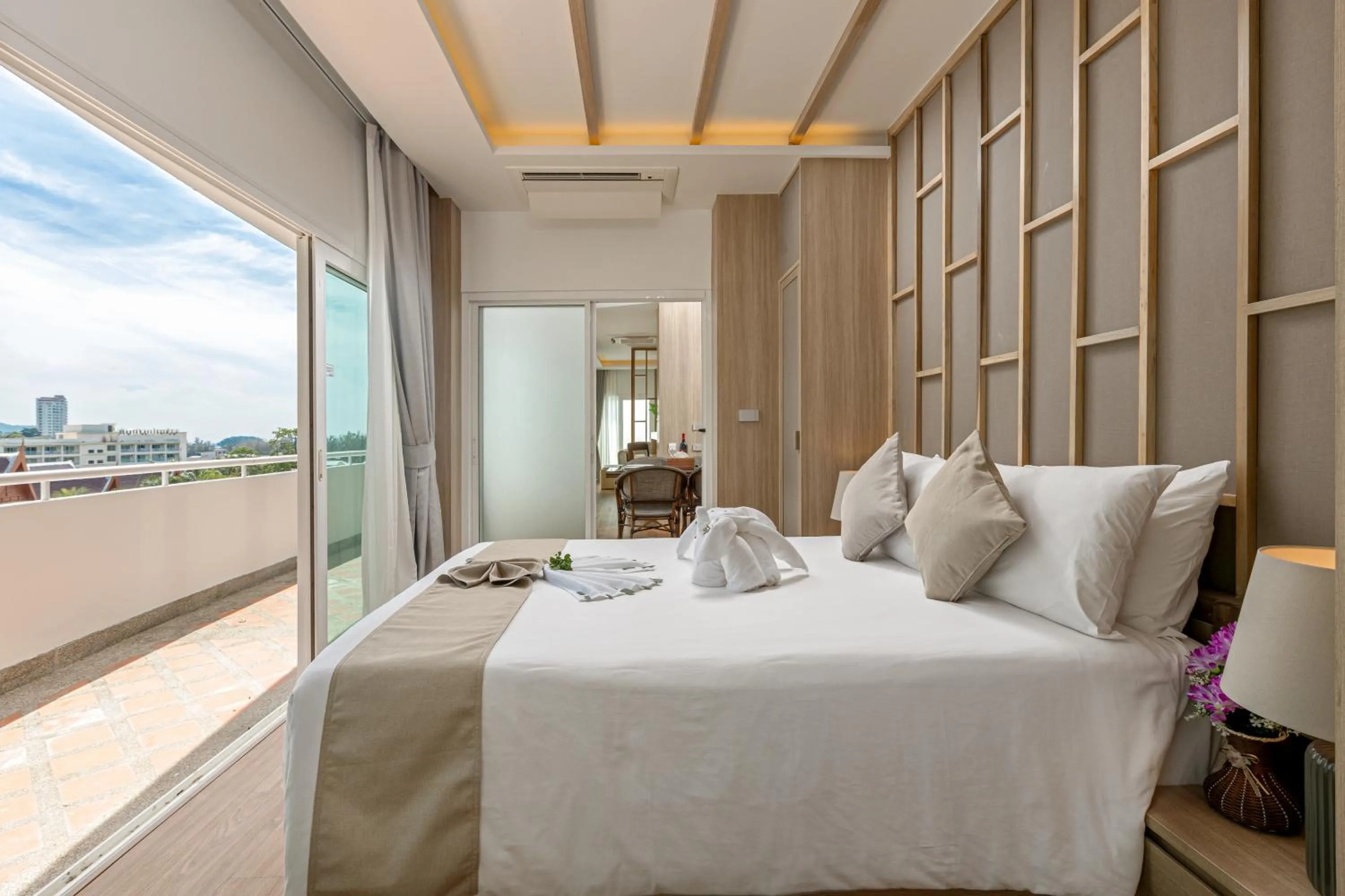 Bed in Phunawa Resort Phuket Karon Beach - SHA Plus