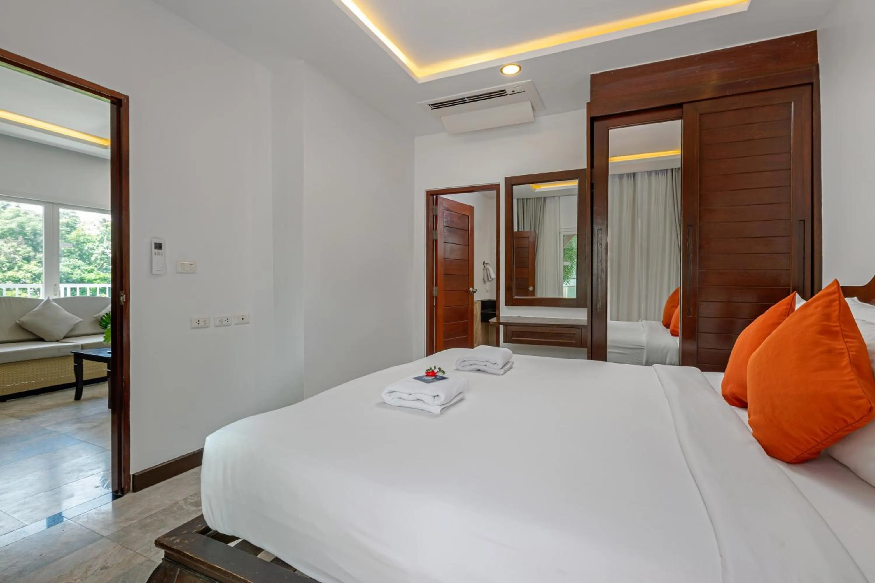 Bed in Phunawa Resort Phuket Karon Beach - SHA Plus
