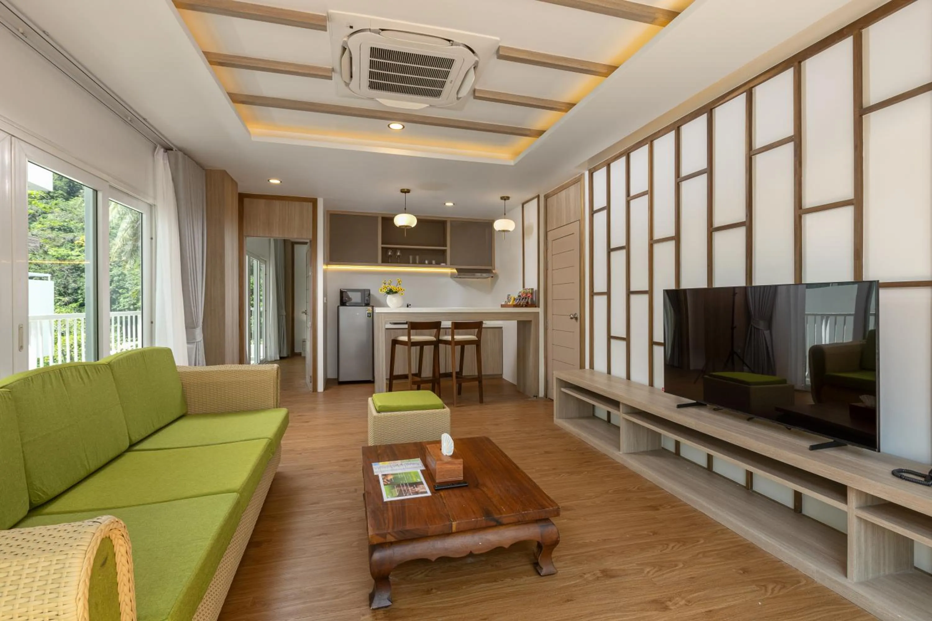 Living room in Phunawa Resort Phuket Karon Beach - SHA Plus