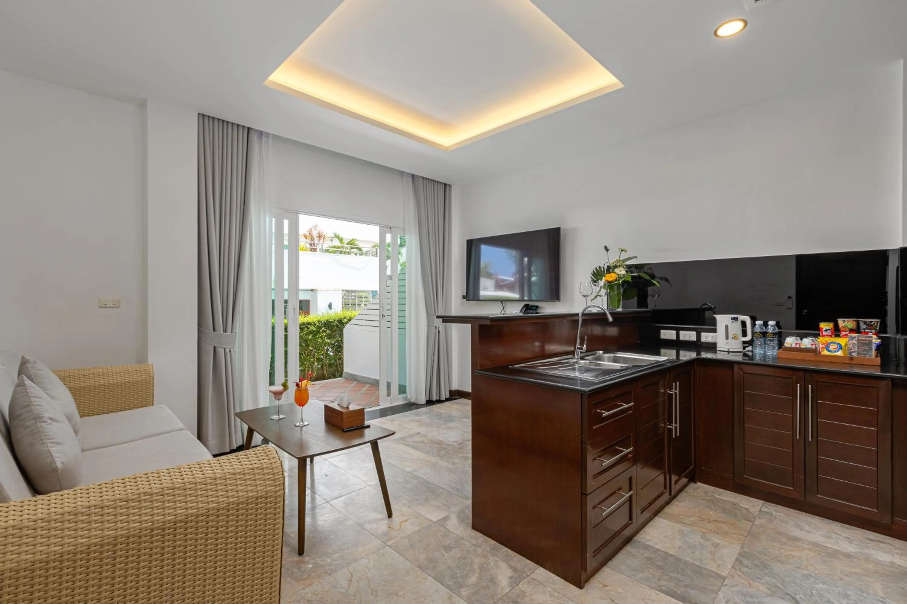 Seating area in Phunawa Resort Phuket Karon Beach - SHA Plus