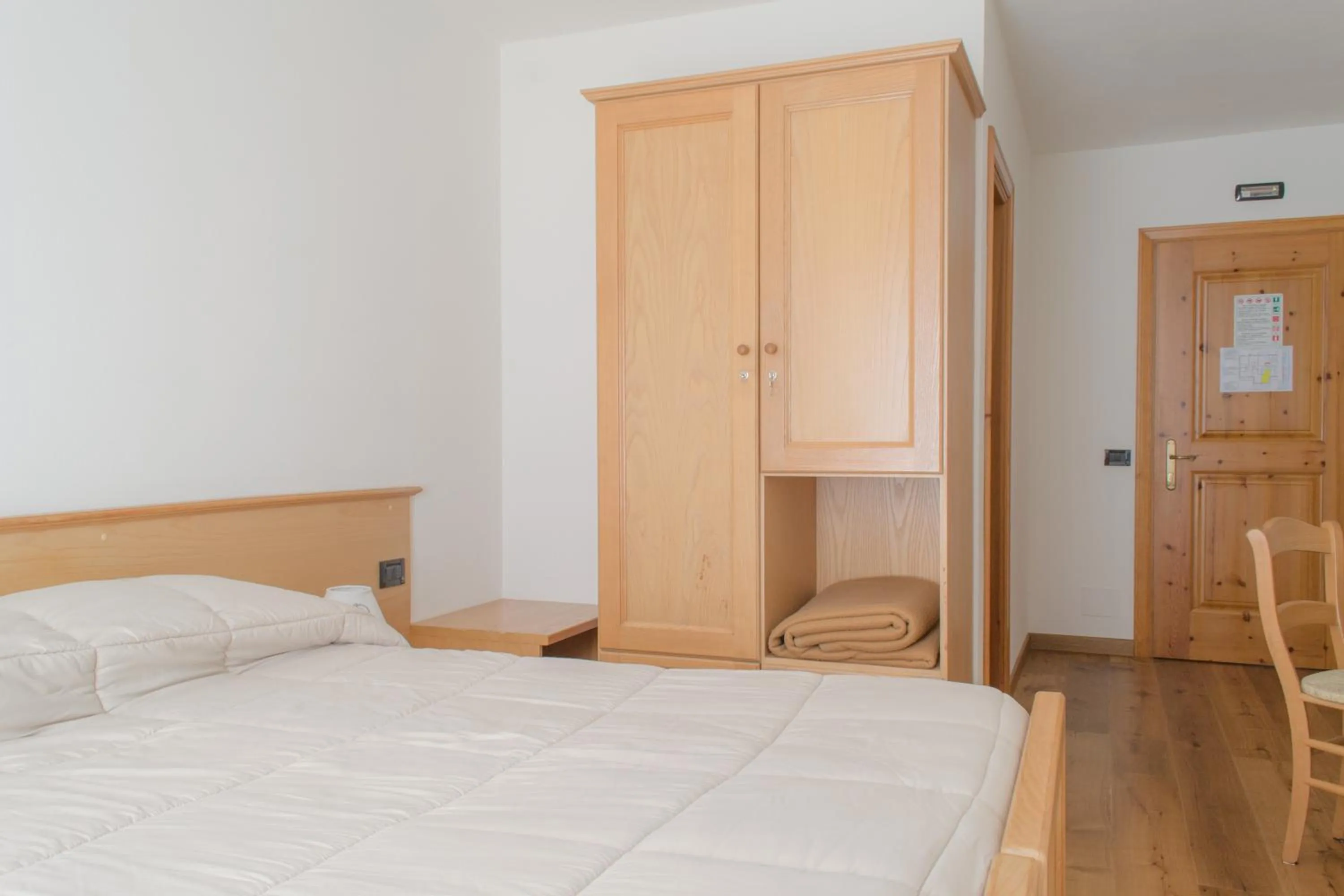 Bed in Meublè Rosalpina