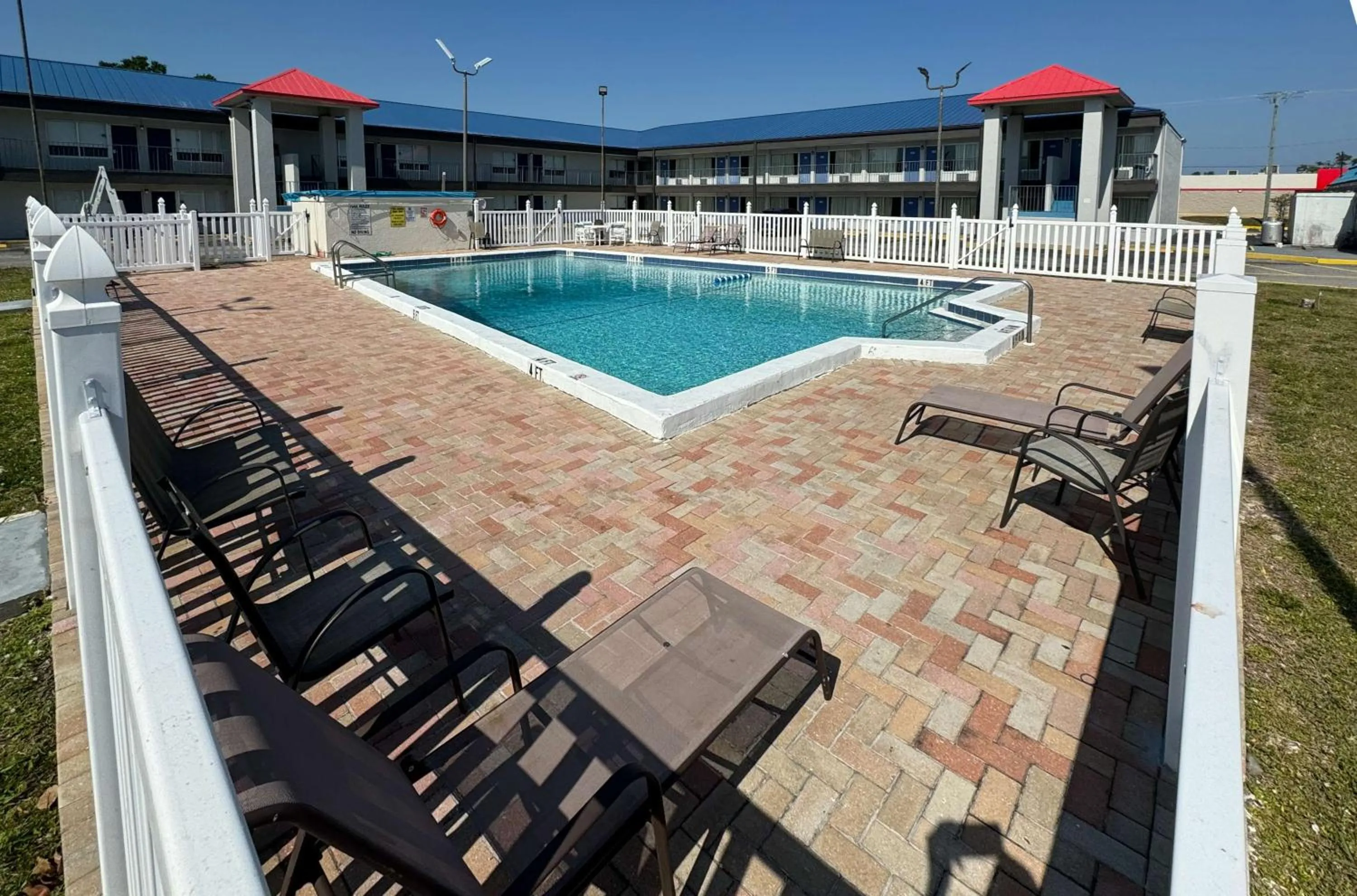 Pool view in Studio 6-Englewood, FL