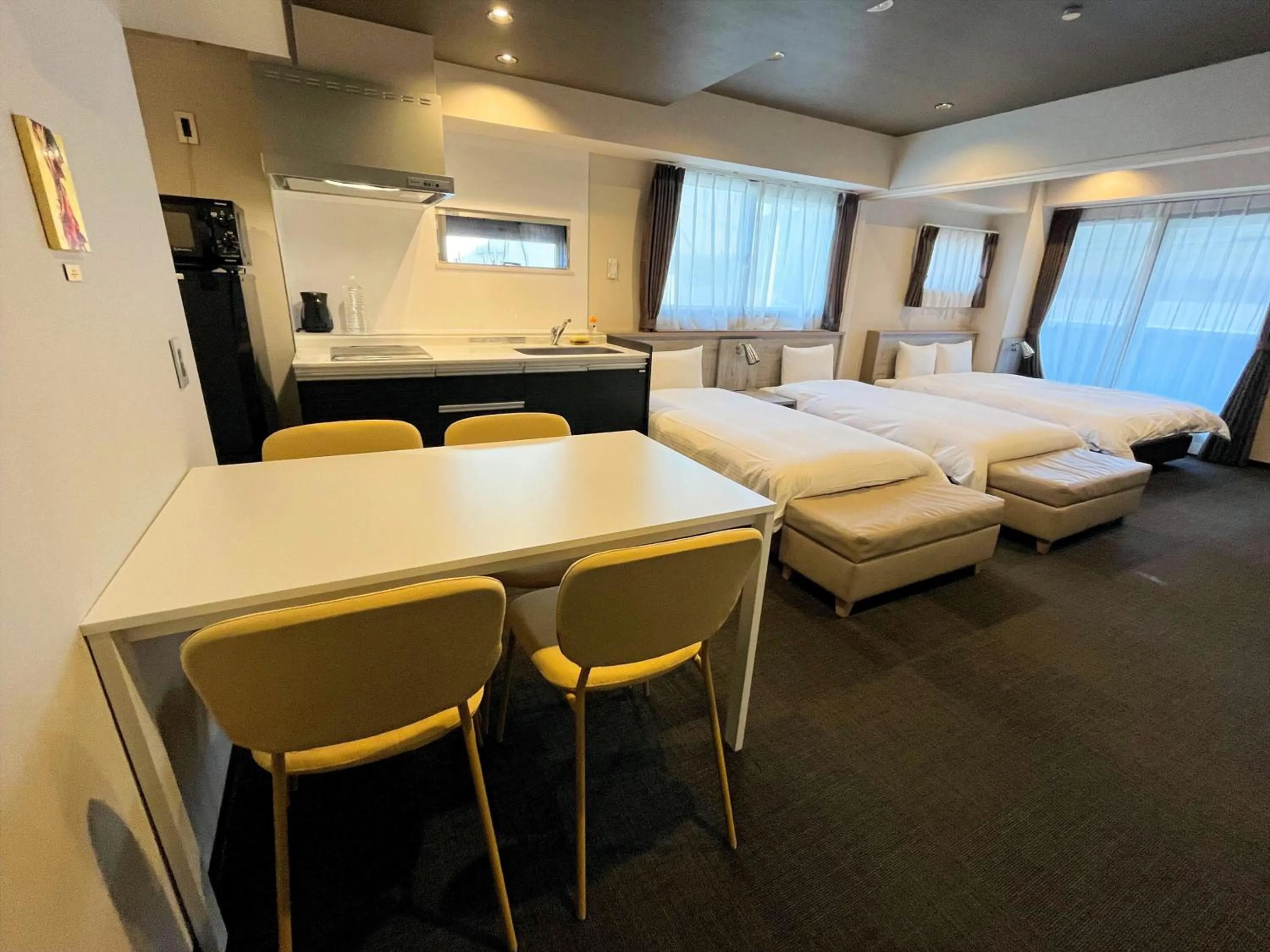 Photo of the whole room, Bed in INOVA Kanazawa