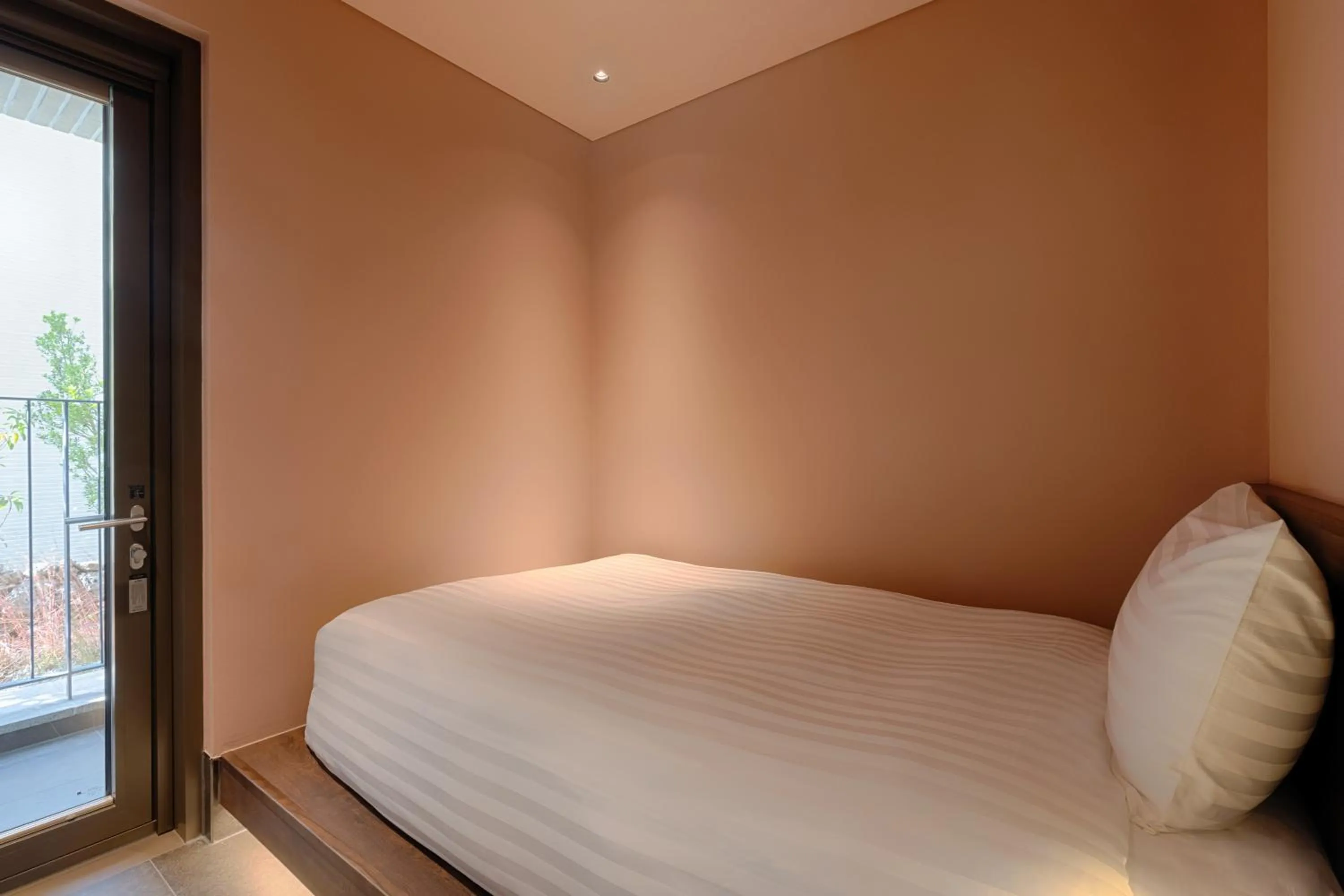 Bed in Sono Calm Jeju