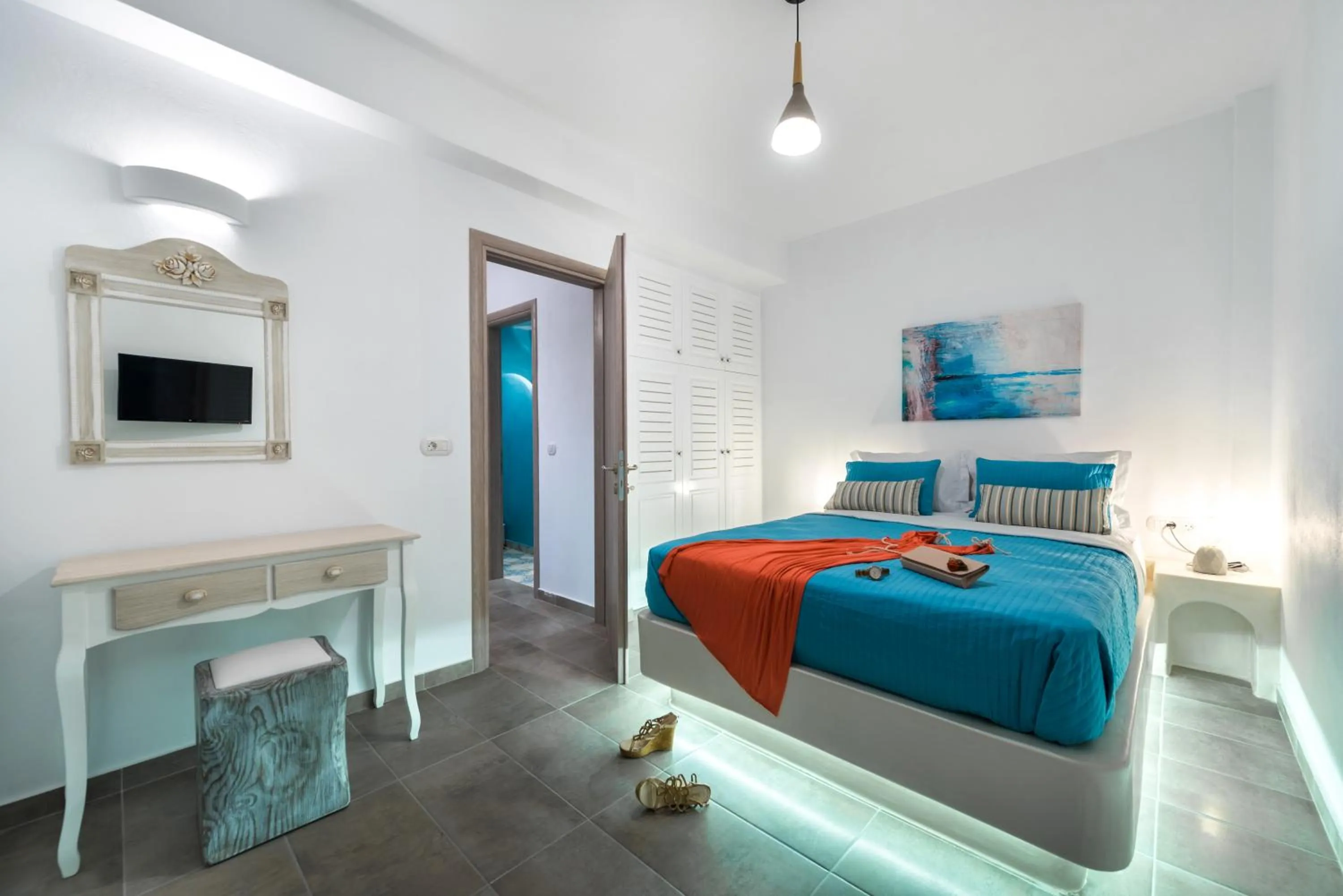 Bed in White Harmony Suites