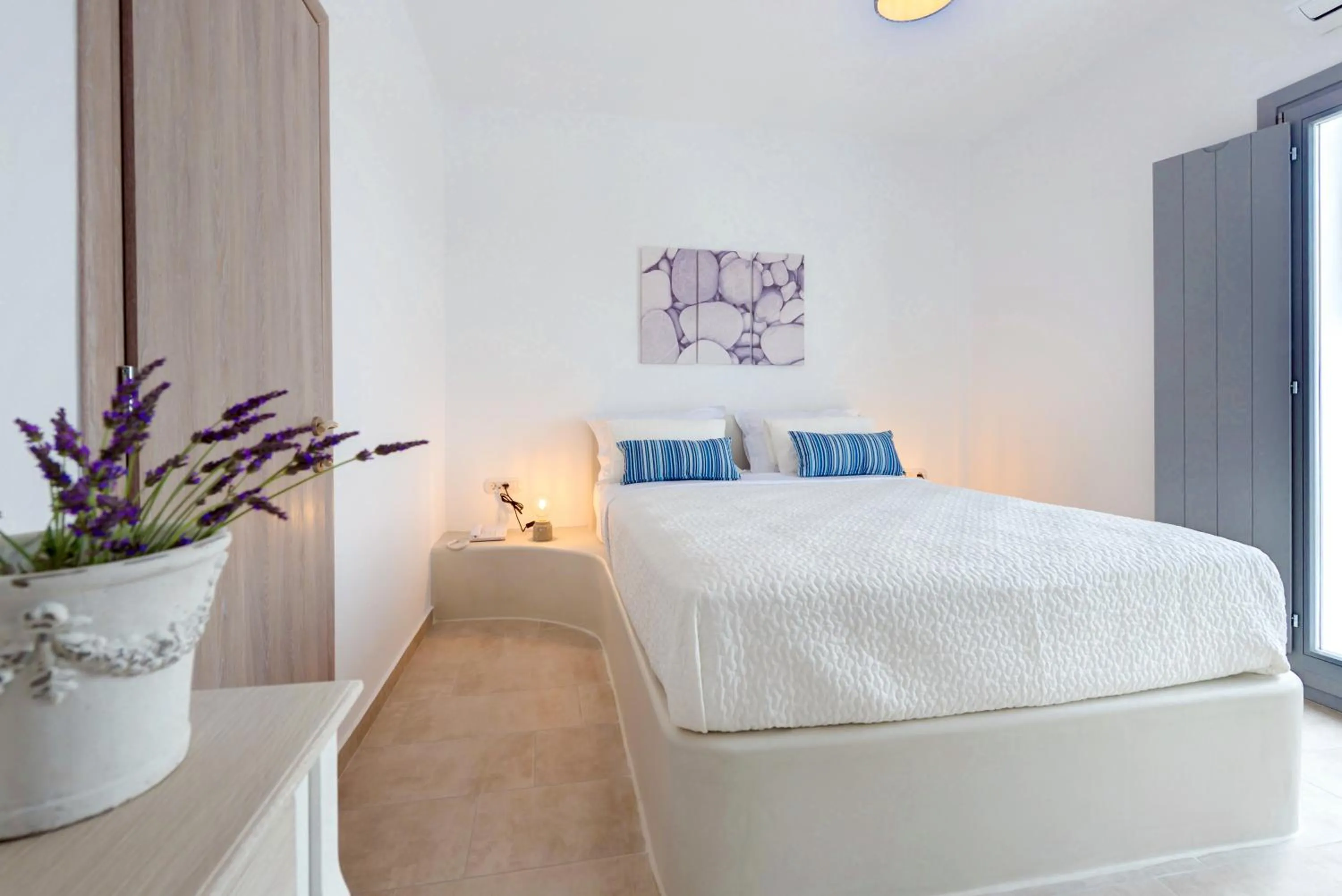 Bed in White Harmony Suites