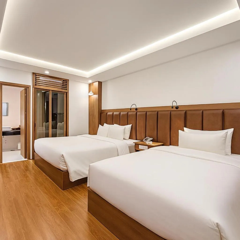 Bed in Du Palace Hotel & Travel