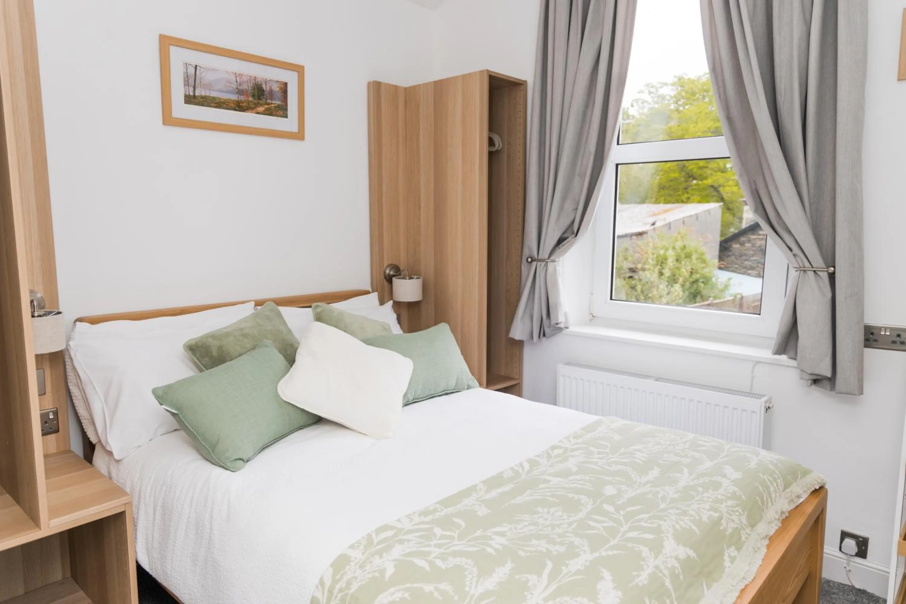 Bed in Denecrest Guest House