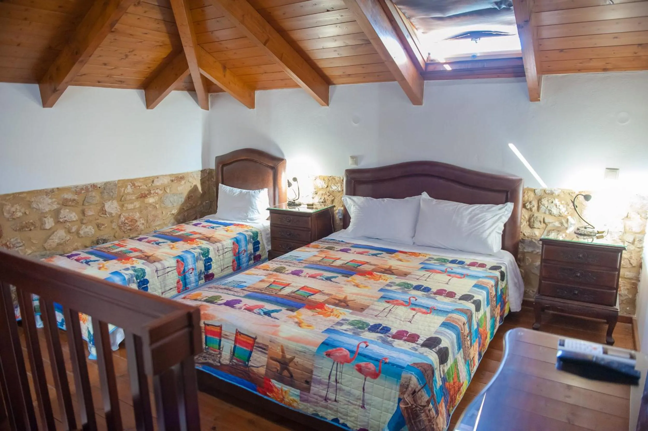 Photo of the whole room, Bed in SeaFront Stone Suites