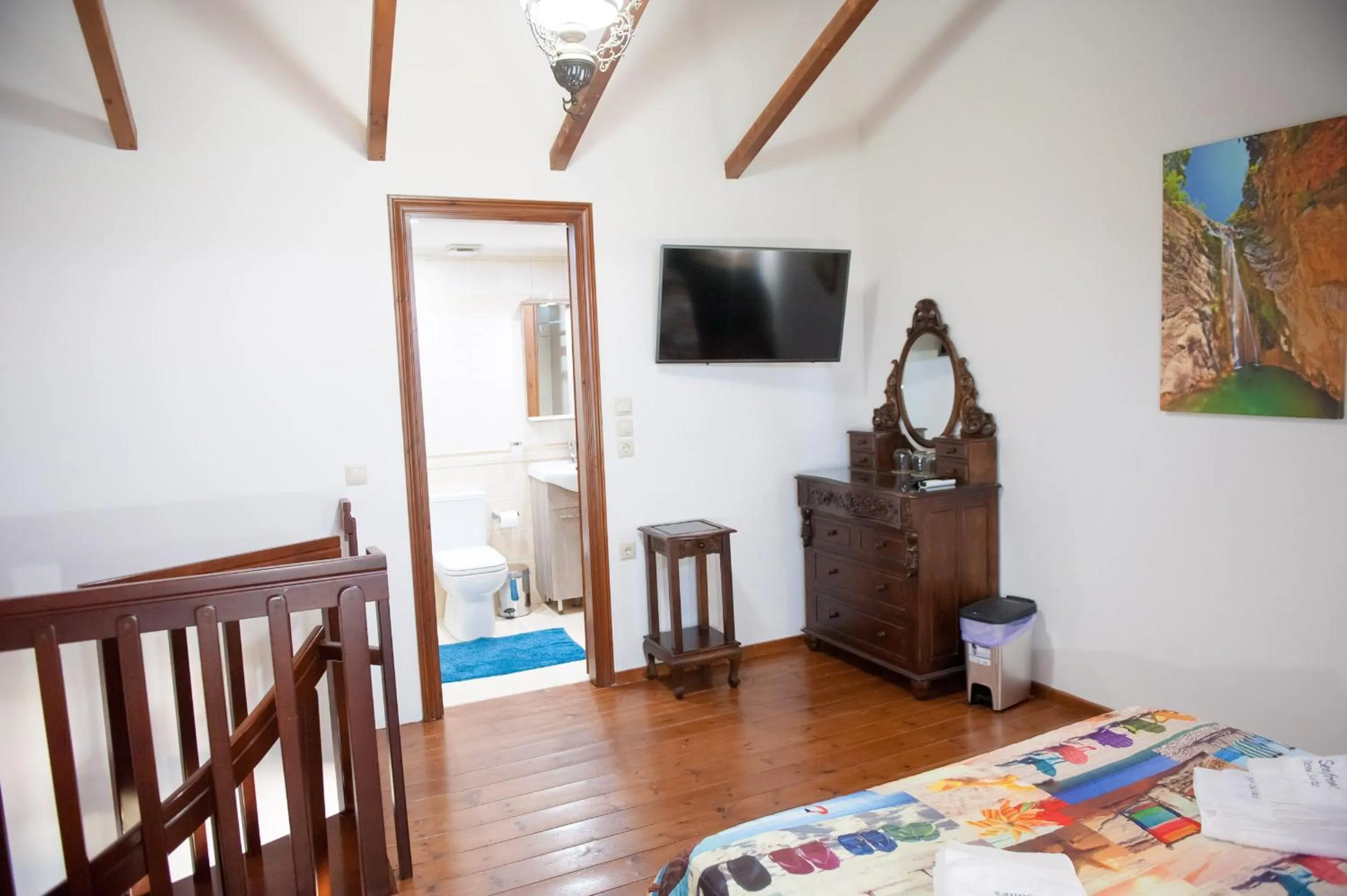 Photo of the whole room, Bed in SeaFront Stone Suites