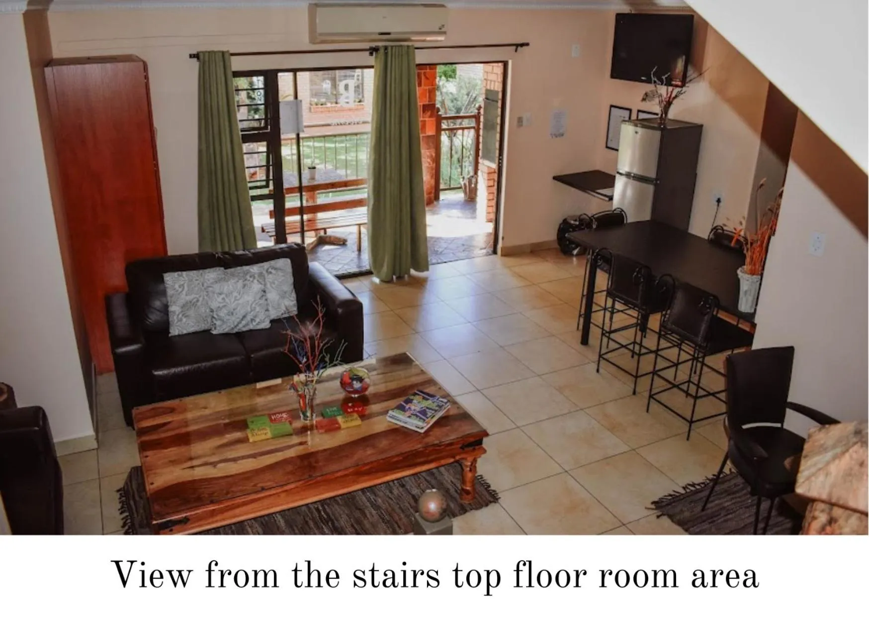 Communal lounge/ TV room in Eldorado Lodge CC