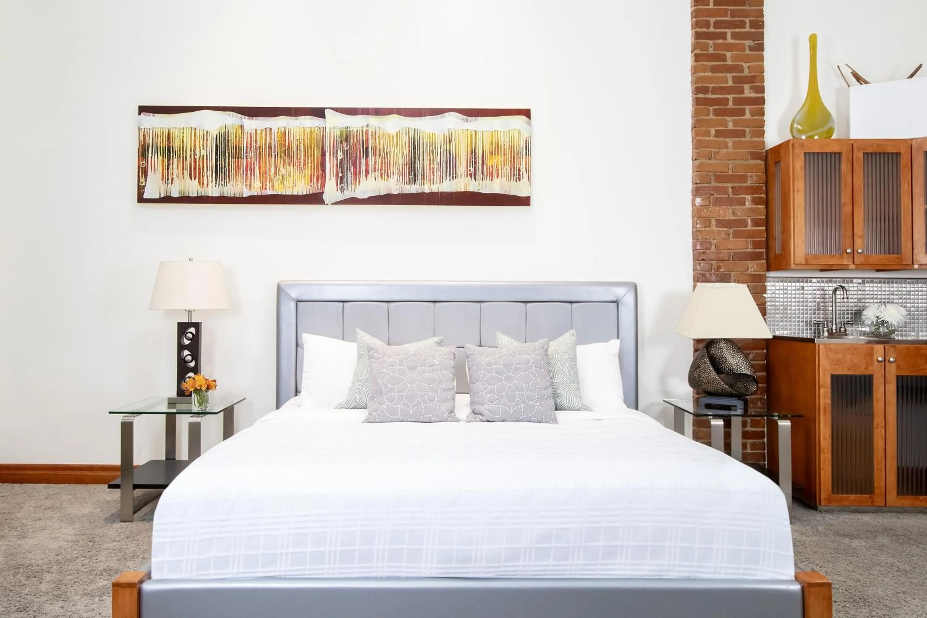 Bed in Retro Suites Hotel