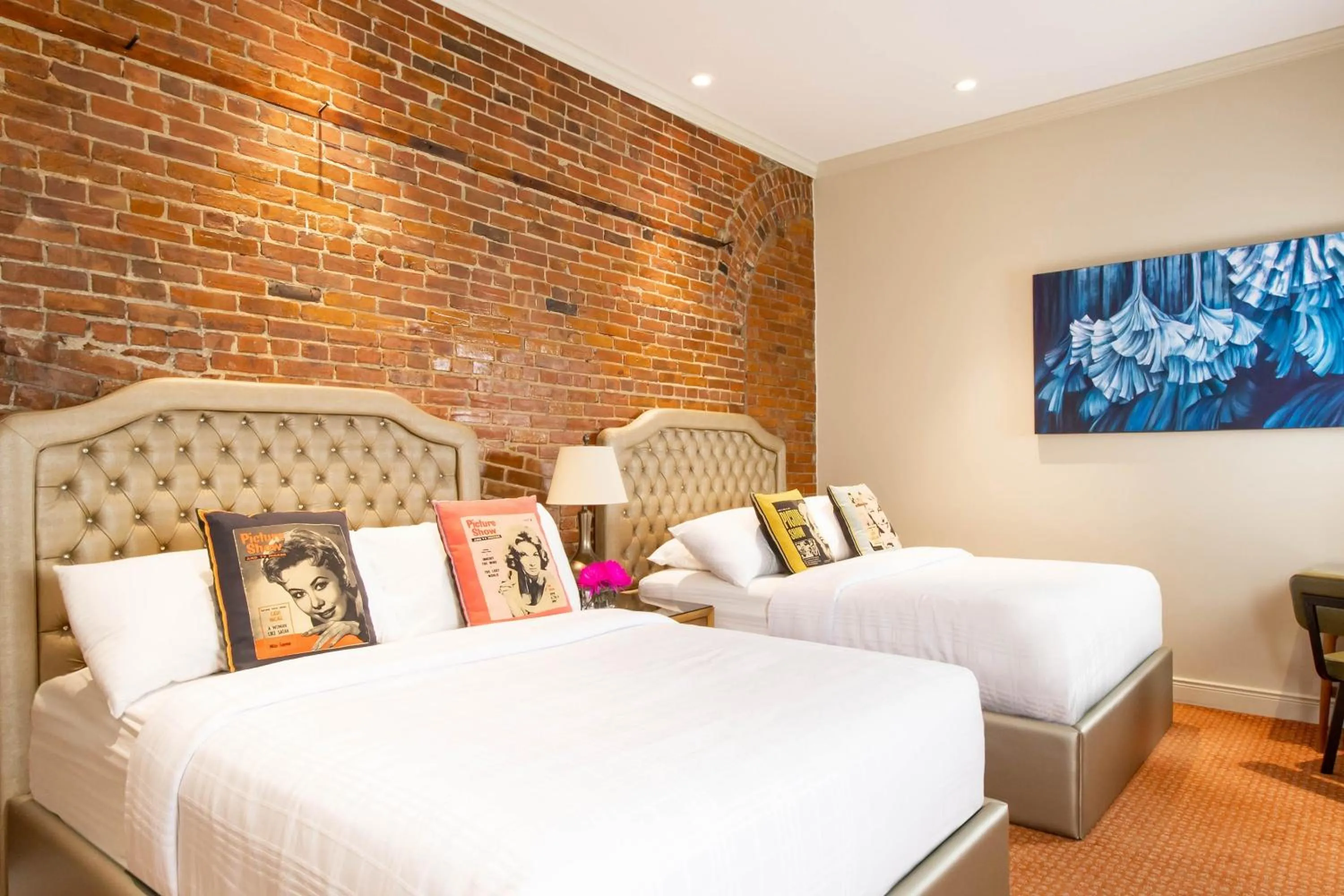 Bed in Retro Suites Hotel