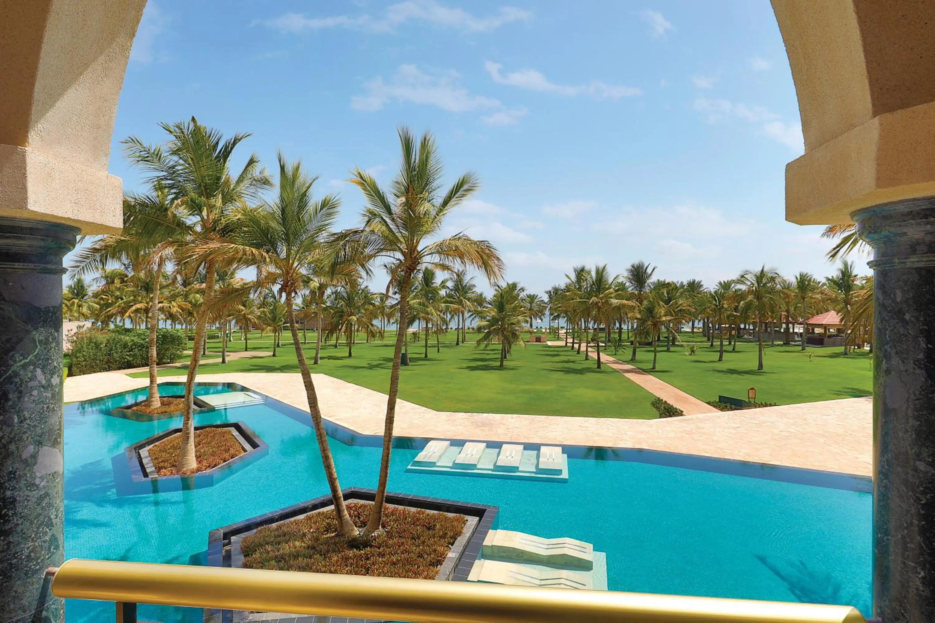 Pool view in Al Bustan Palace, a Ritz-Carlton Hotel