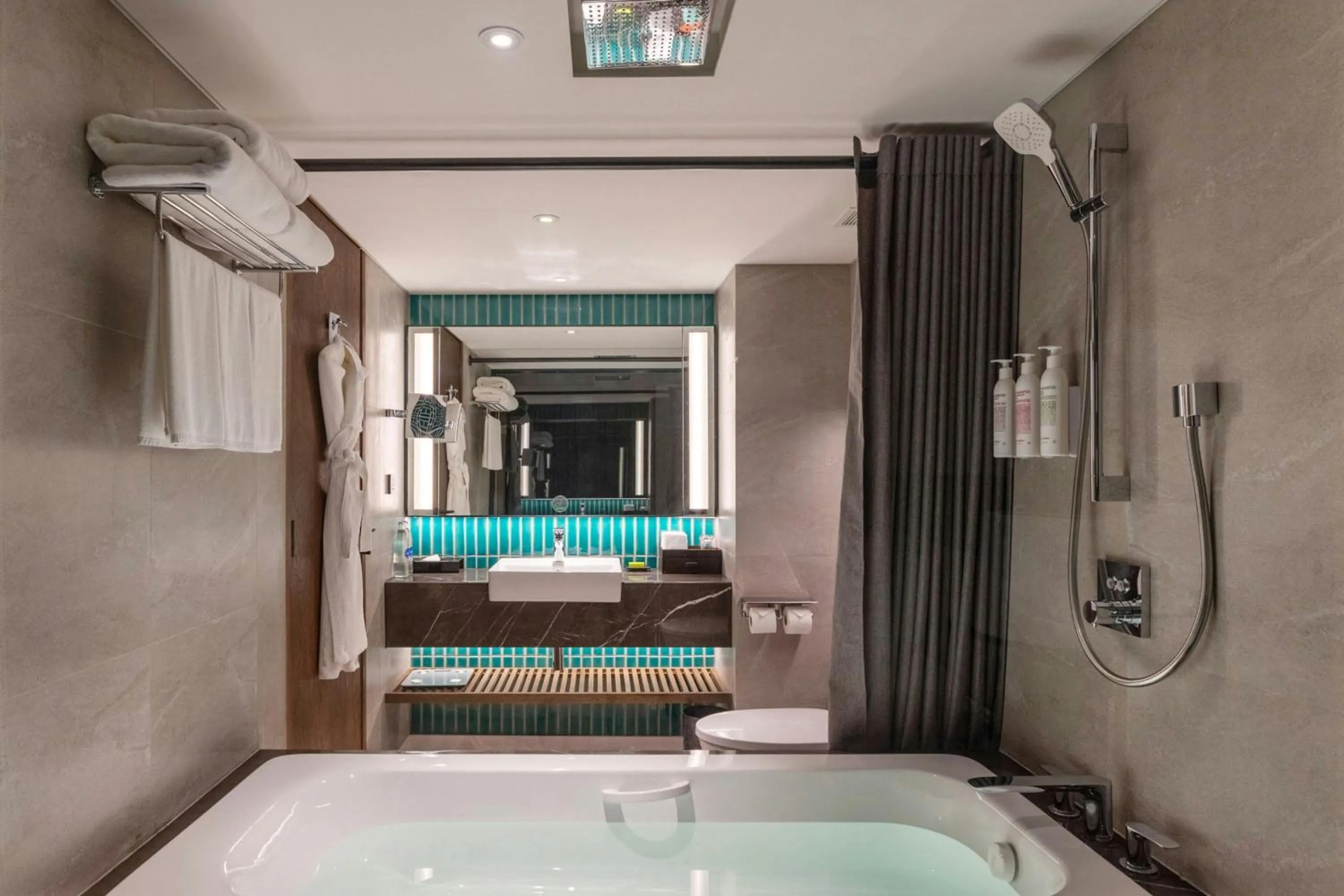 Bathroom, Bed in Le Meridien Phuket Beach Resort