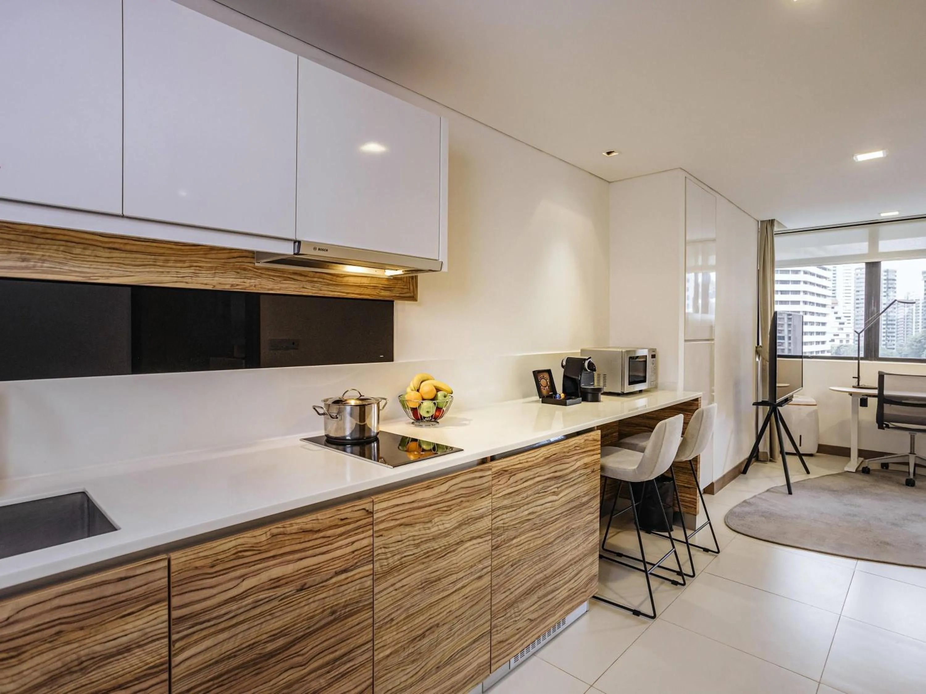 Bedroom in Novotel Living Singapore Orchard