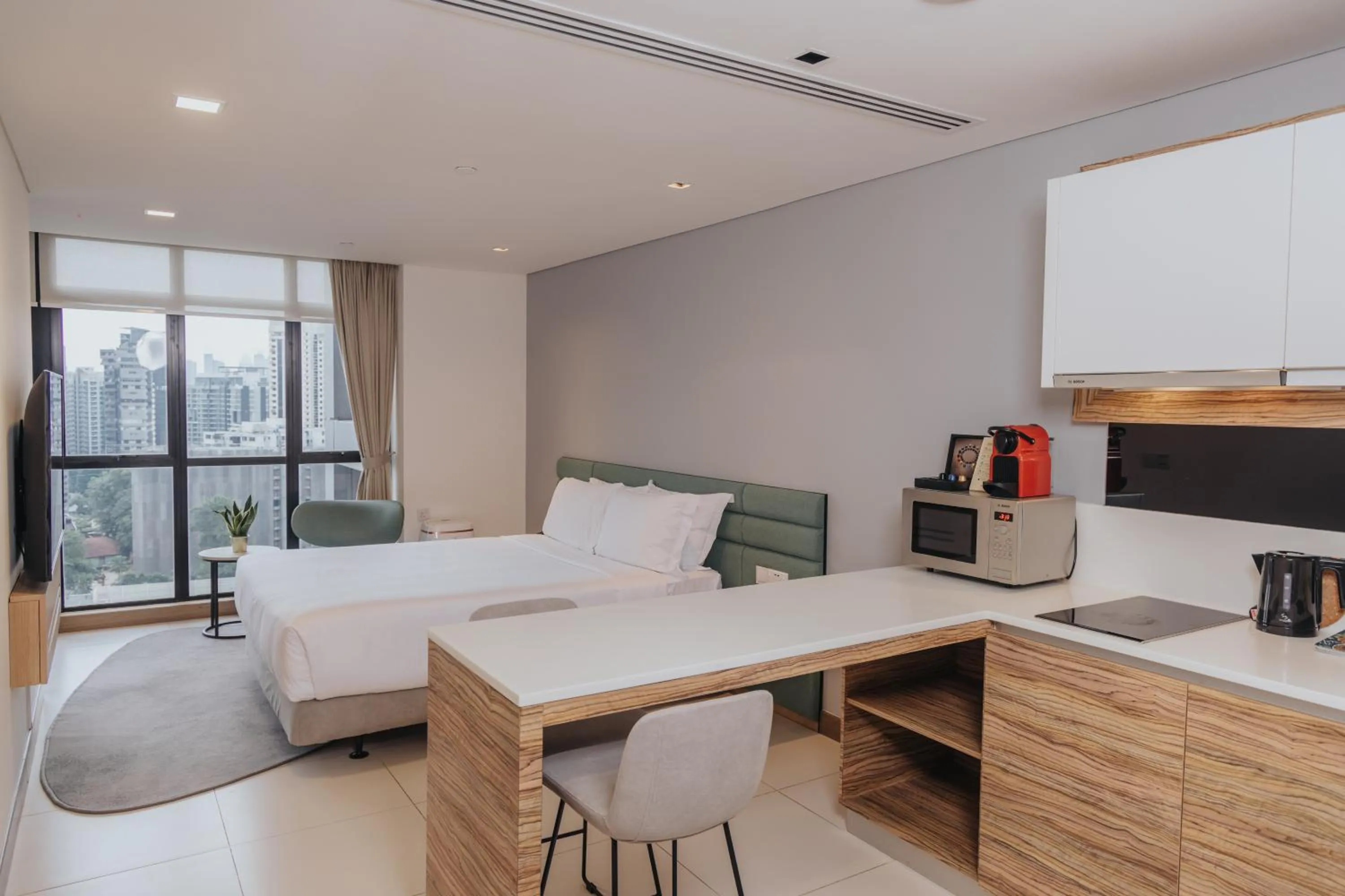 Bedroom, Bed in Novotel Living Singapore Orchard