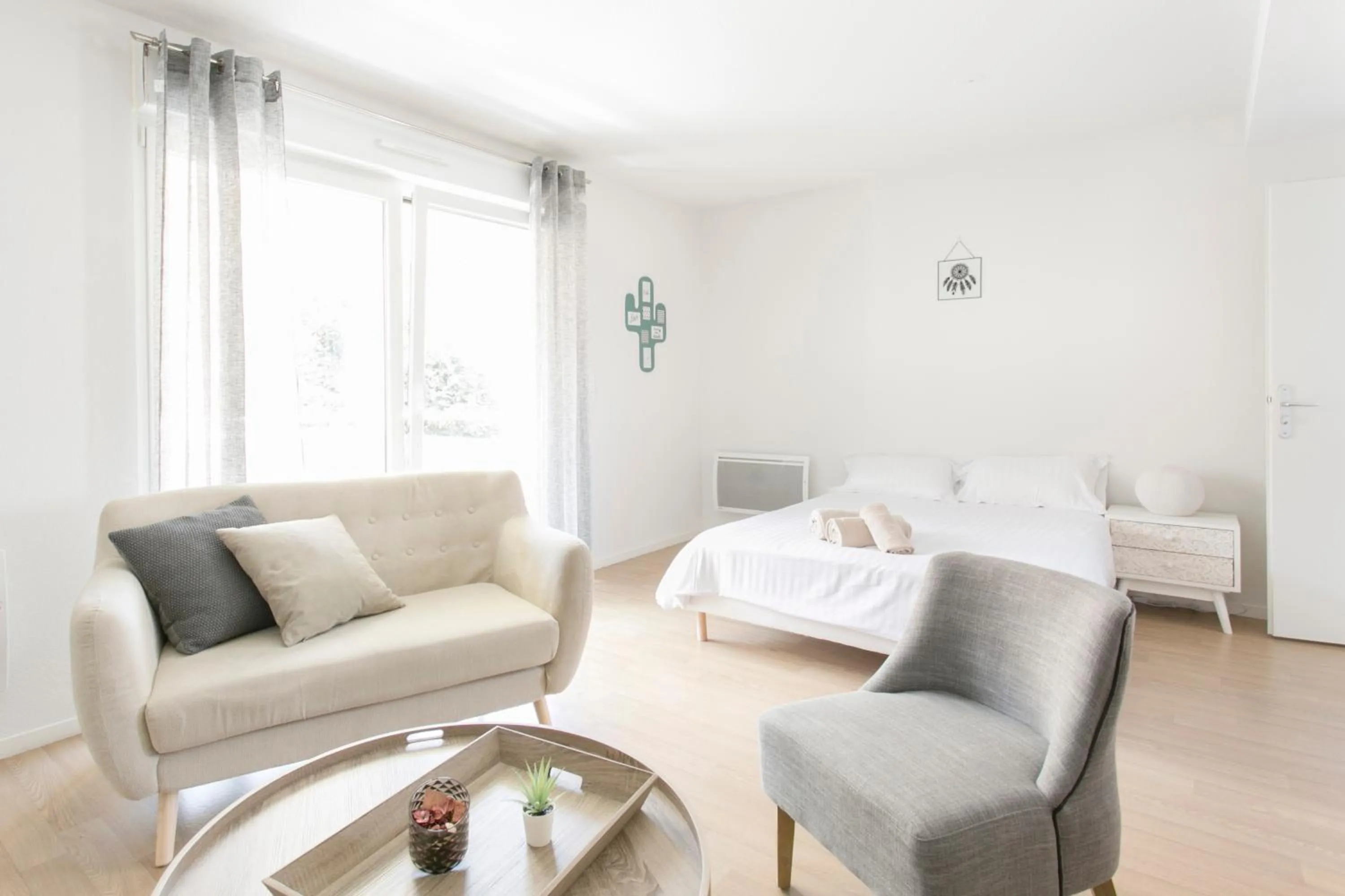 Living room, Bed in Zenao Appart'hôtels Mulhouse