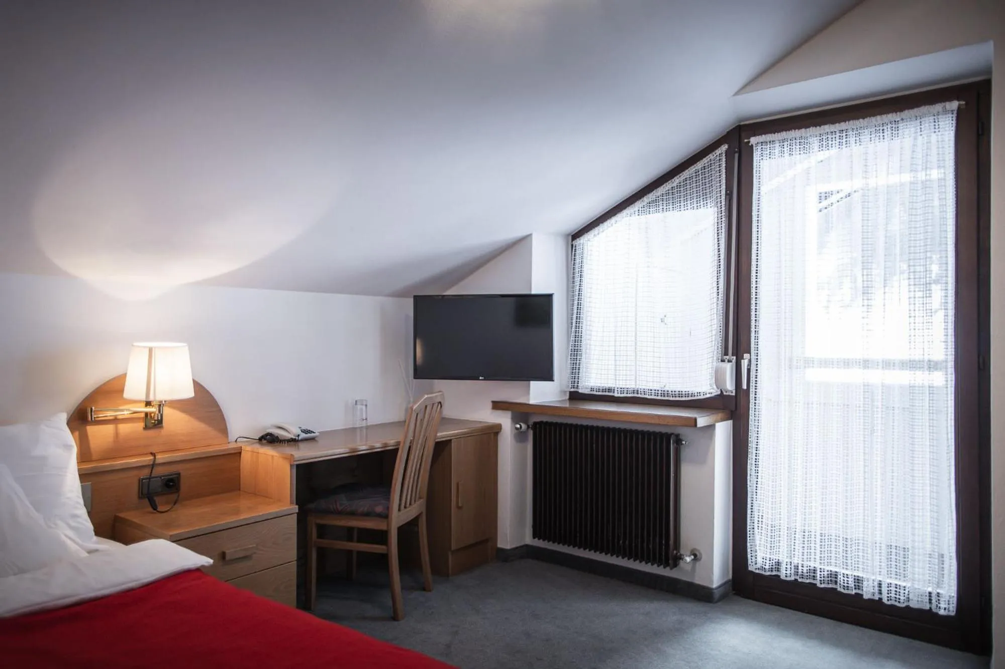 Bed in Hotel Mühlwald