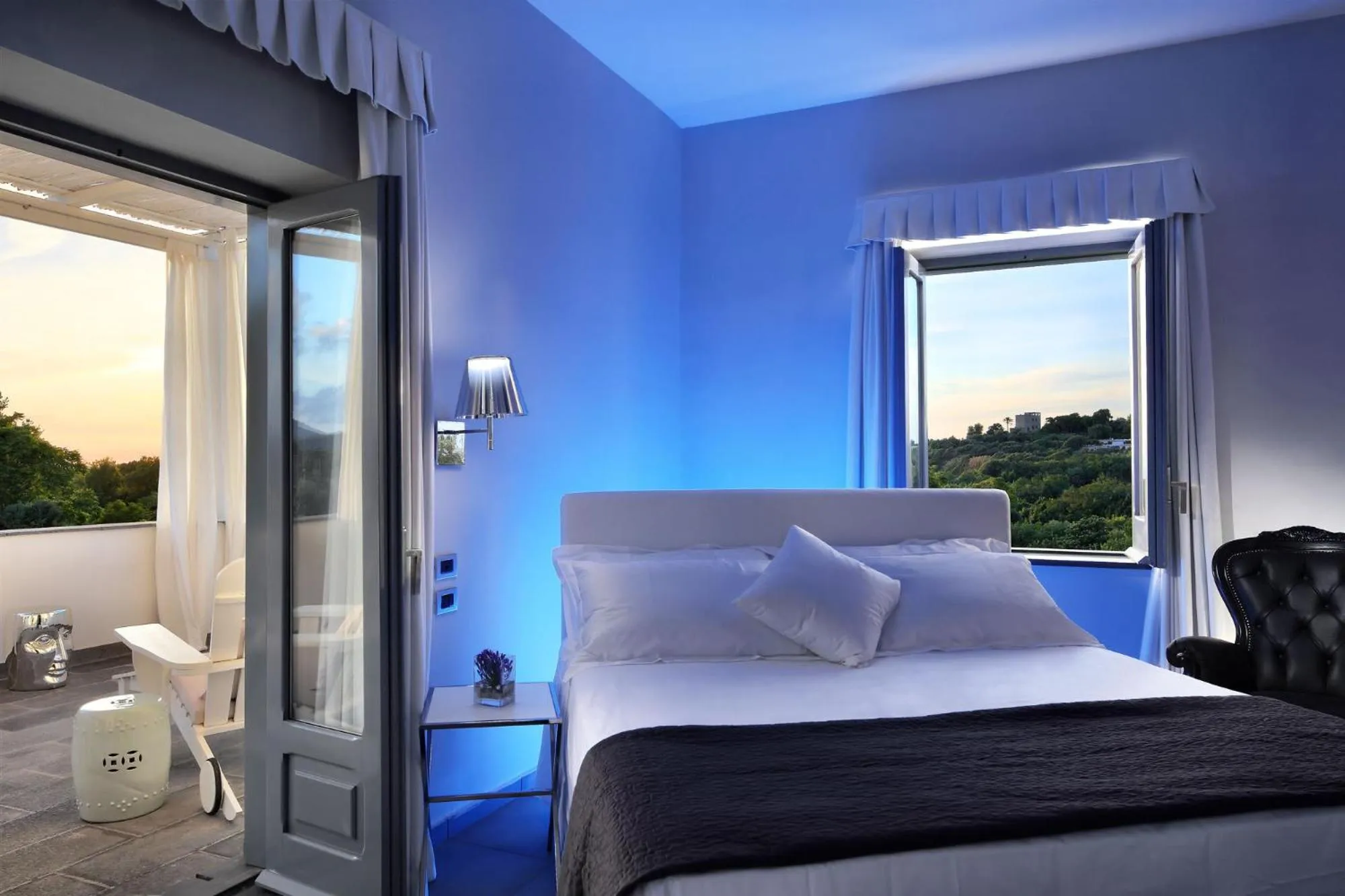 Bed in La Suite Boutique Hotel