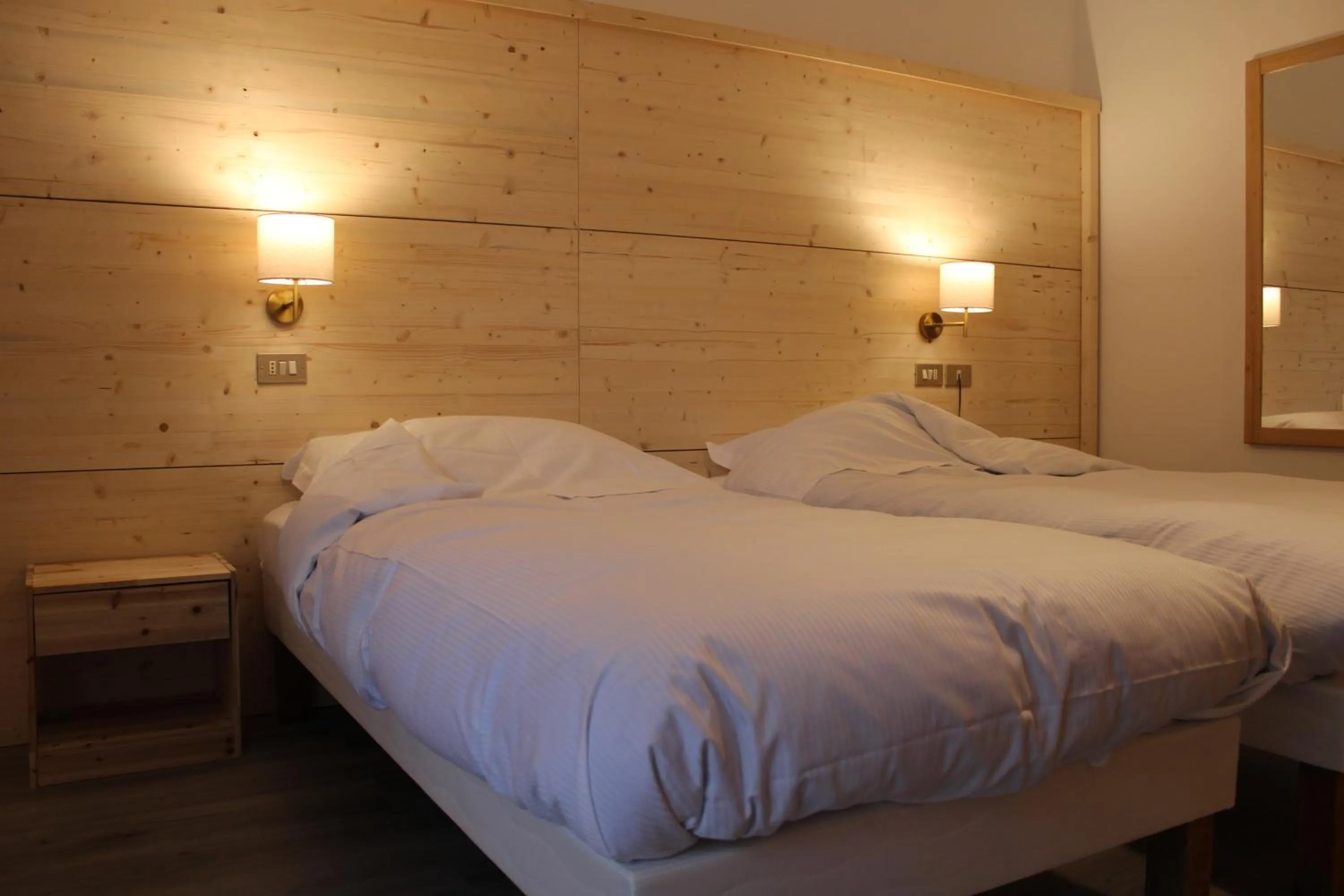 Bed in Hotel Rododendro Val di Fassa