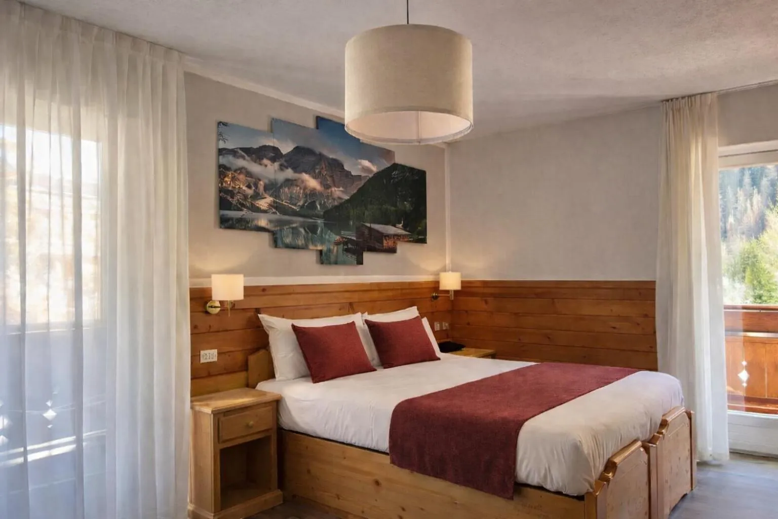 Bed in Hotel Rododendro Val di Fassa