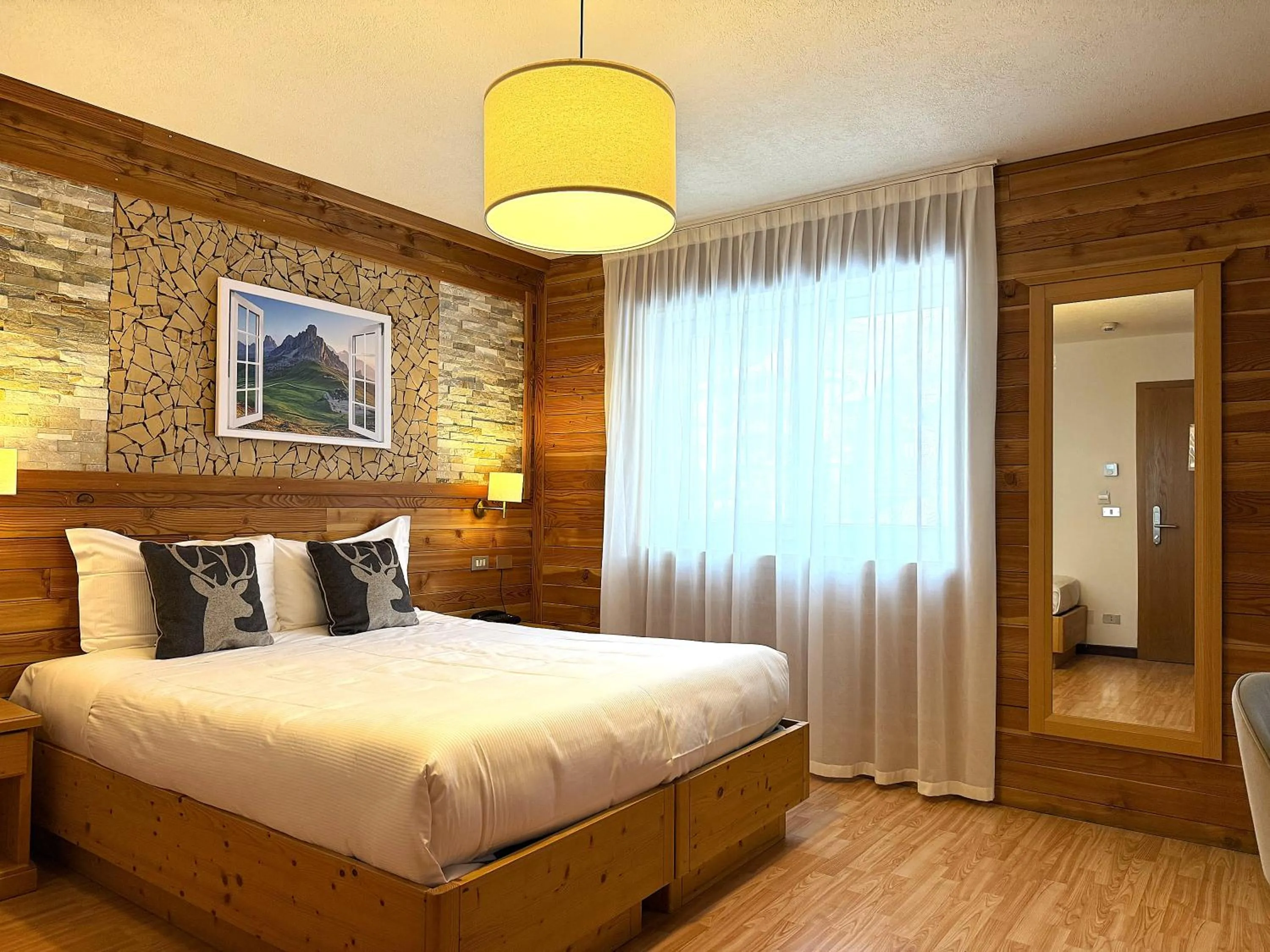 Bed in Hotel Rododendro Val di Fassa