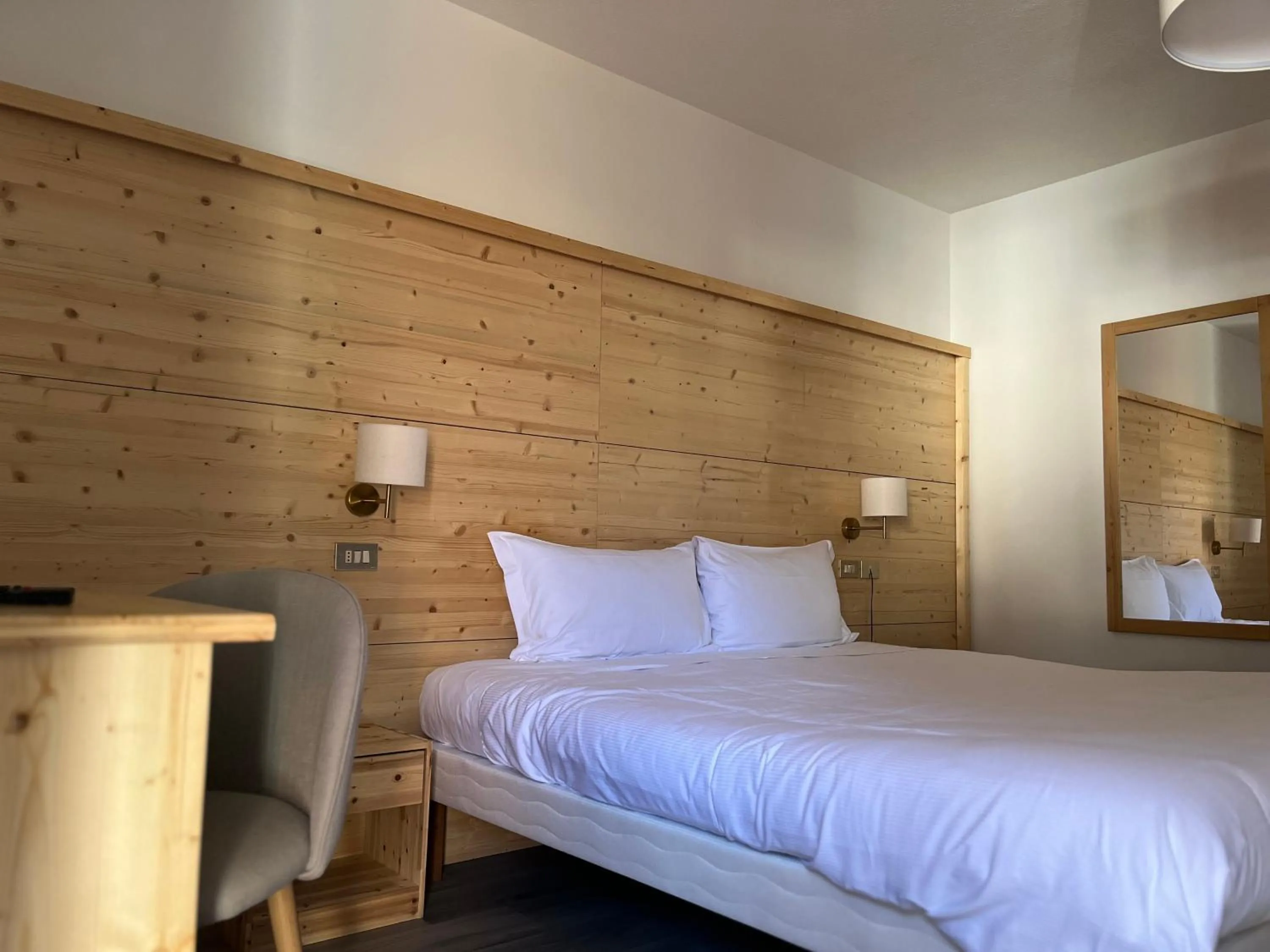 Bed in Hotel Rododendro Val di Fassa