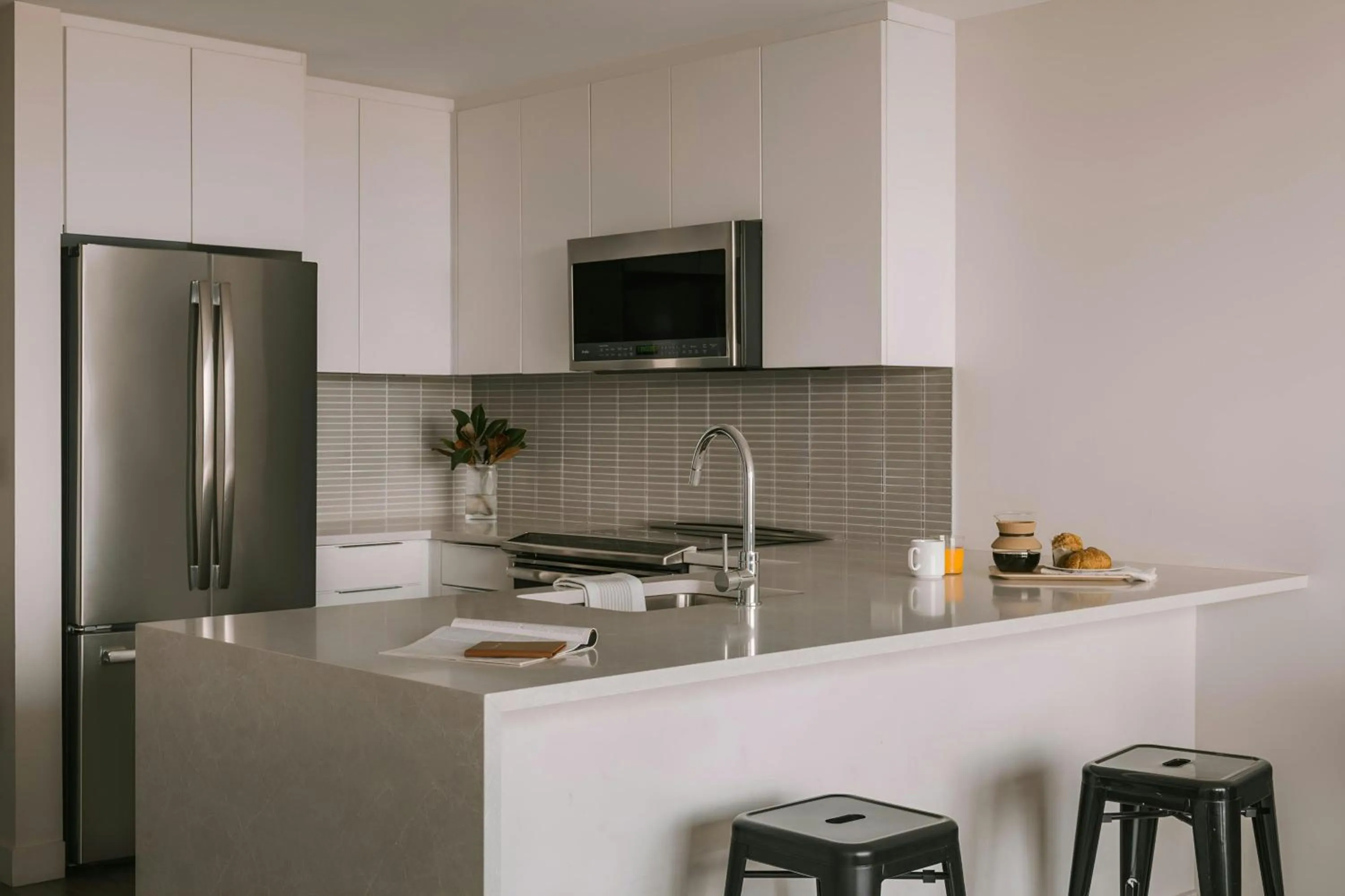 Kitchen or kitchenette in Sonder by Marriott Bonvoy Pierce Boston Apartments Fenway