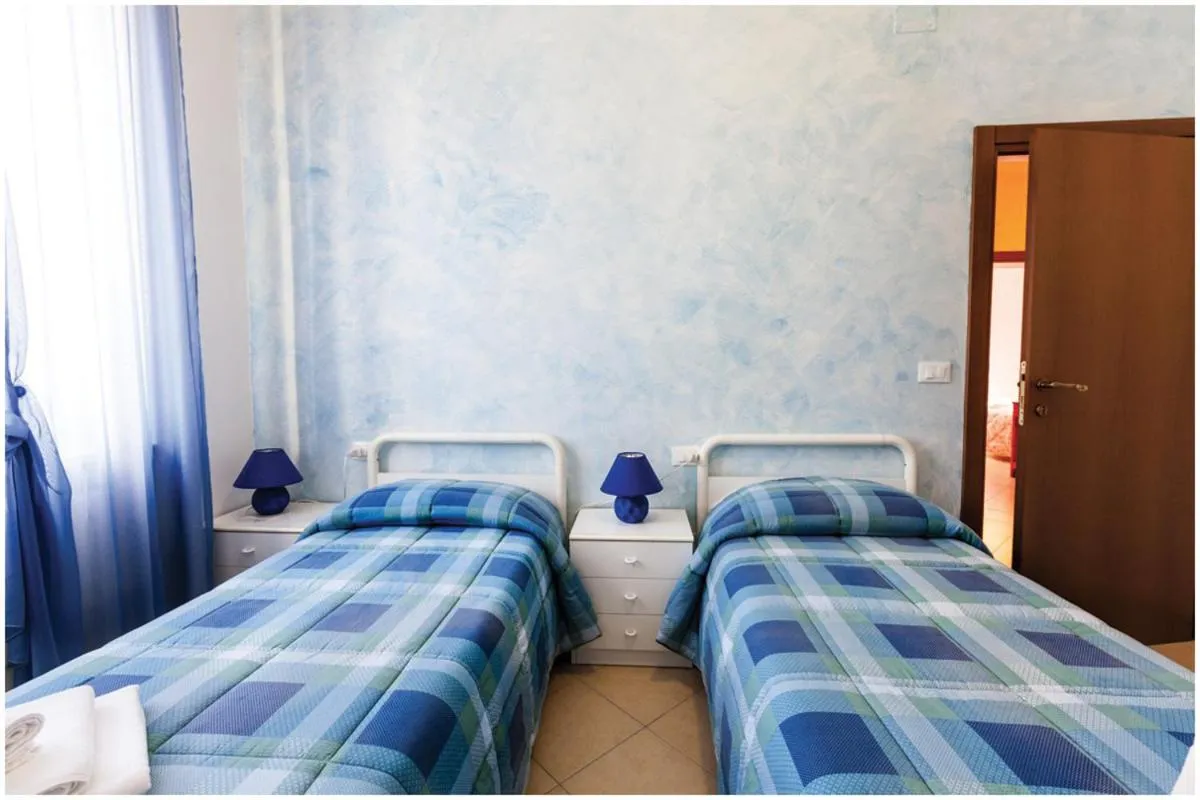 Bed in Guest House Il Faro