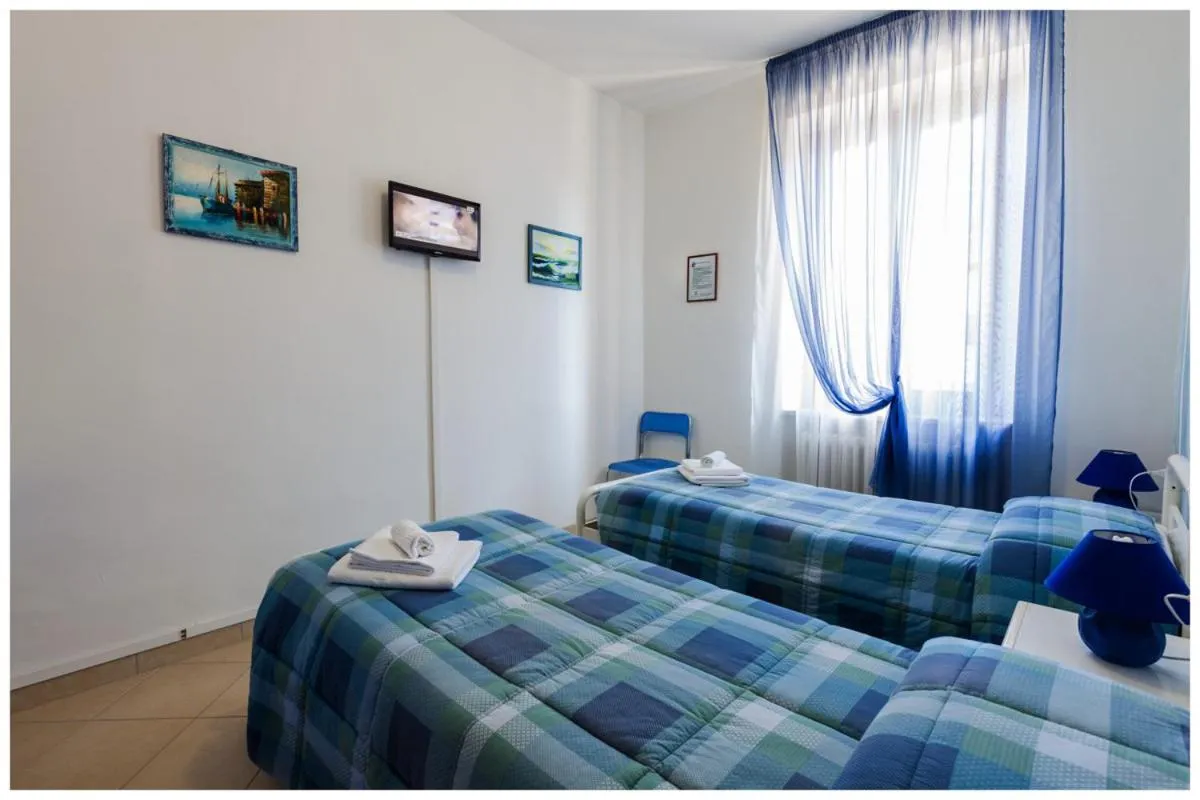 Bed in Guest House Il Faro