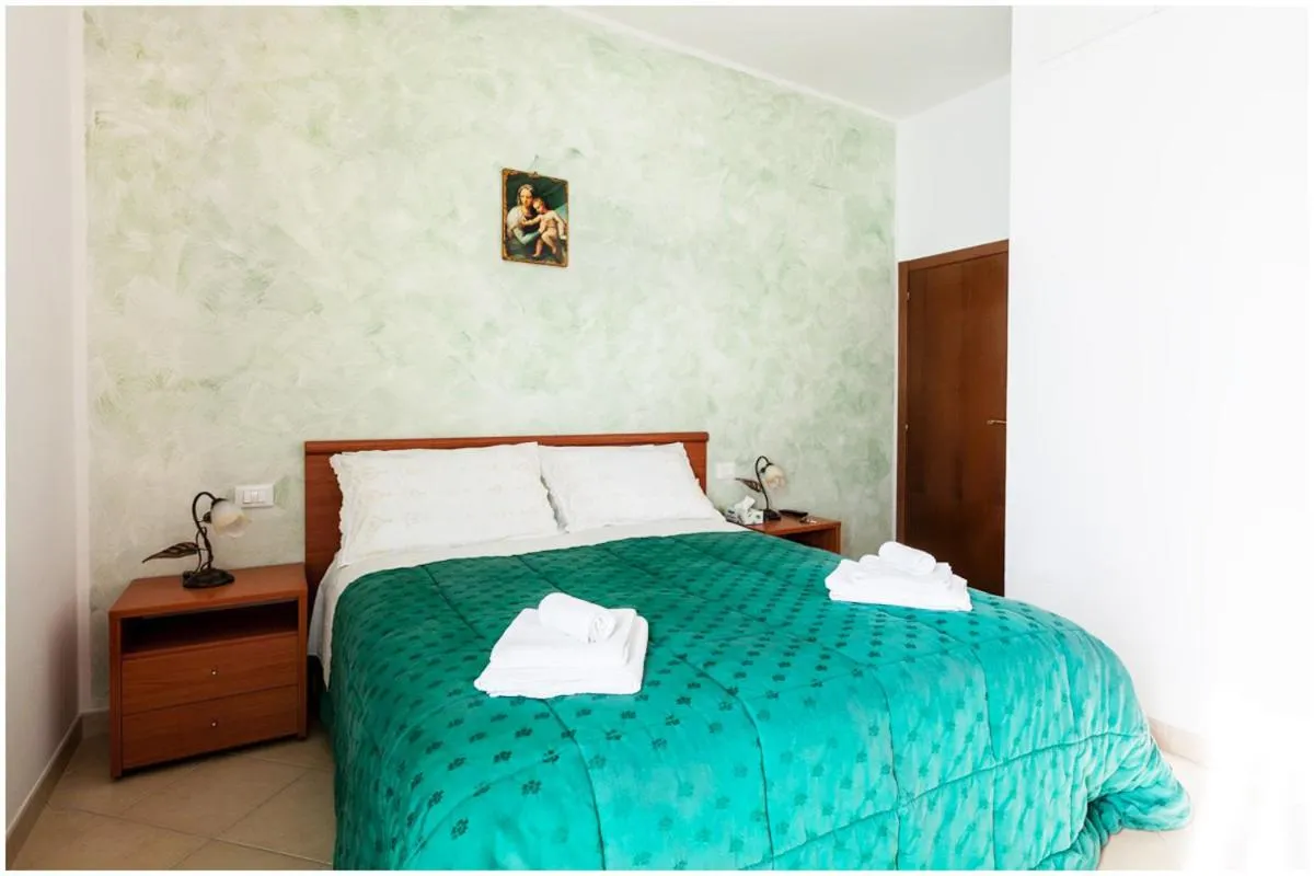 Bed in Guest House Il Faro