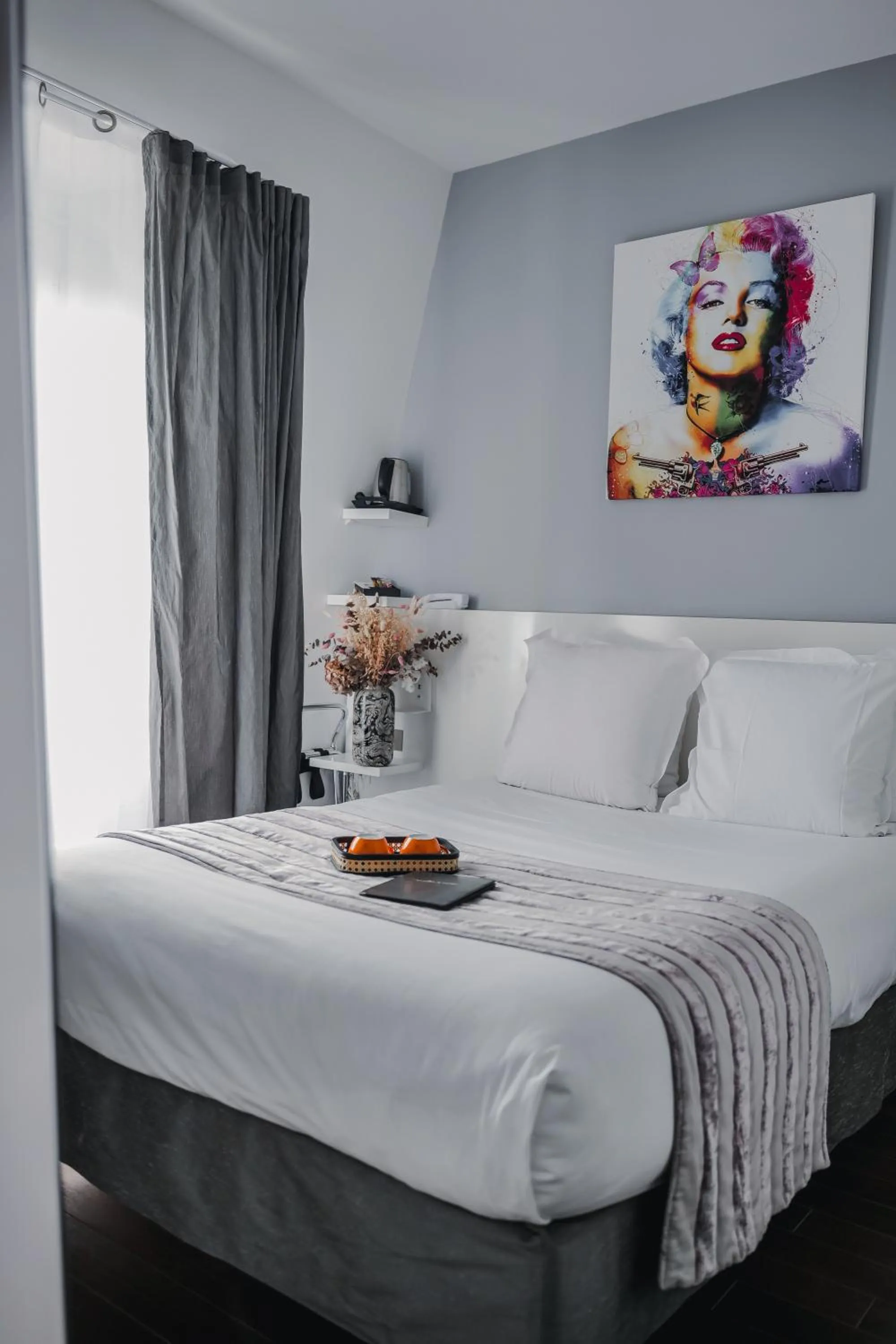 Bed in Le Manoir Hôtel