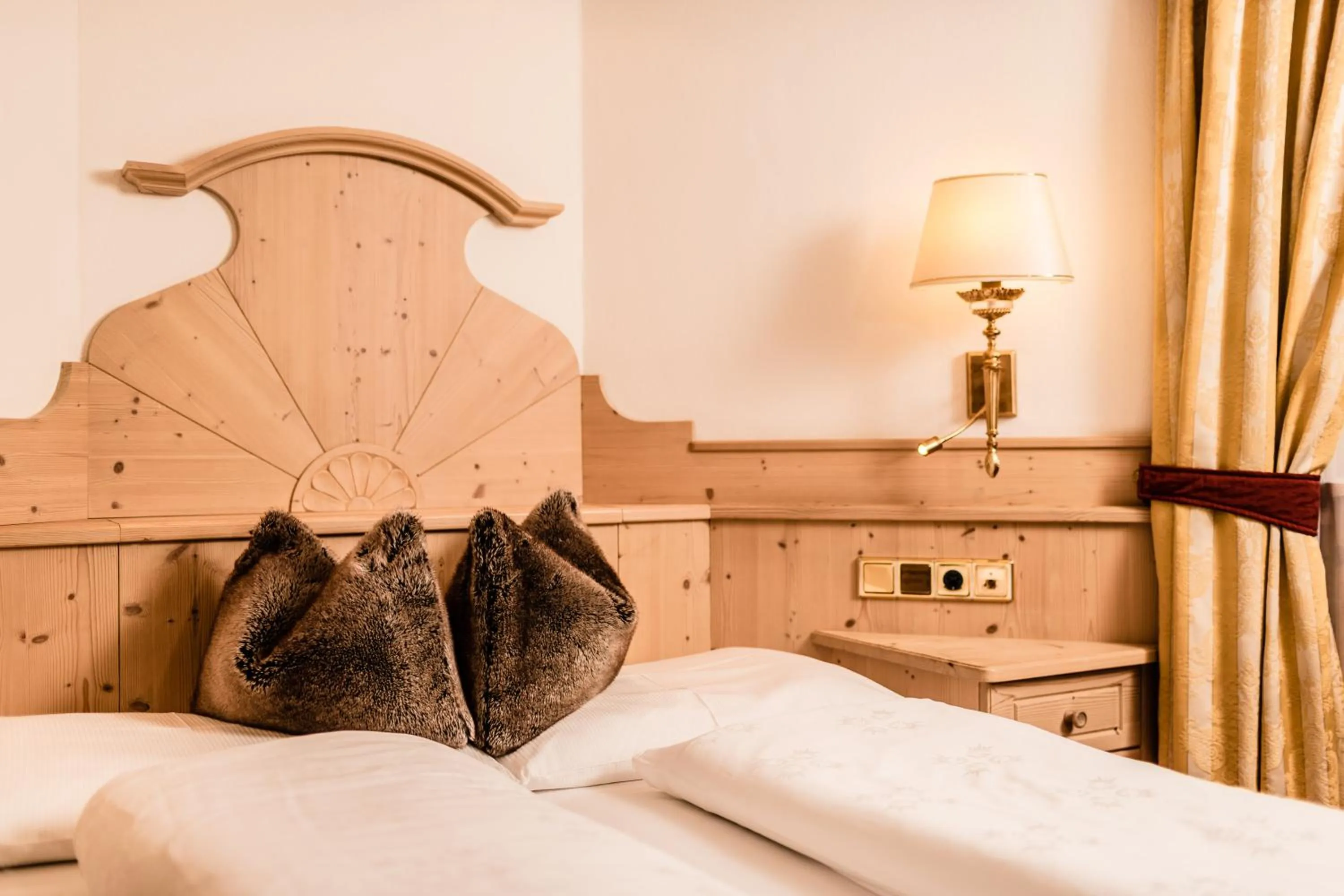 Bed in Romantik & Family Hotel Gardenia***S