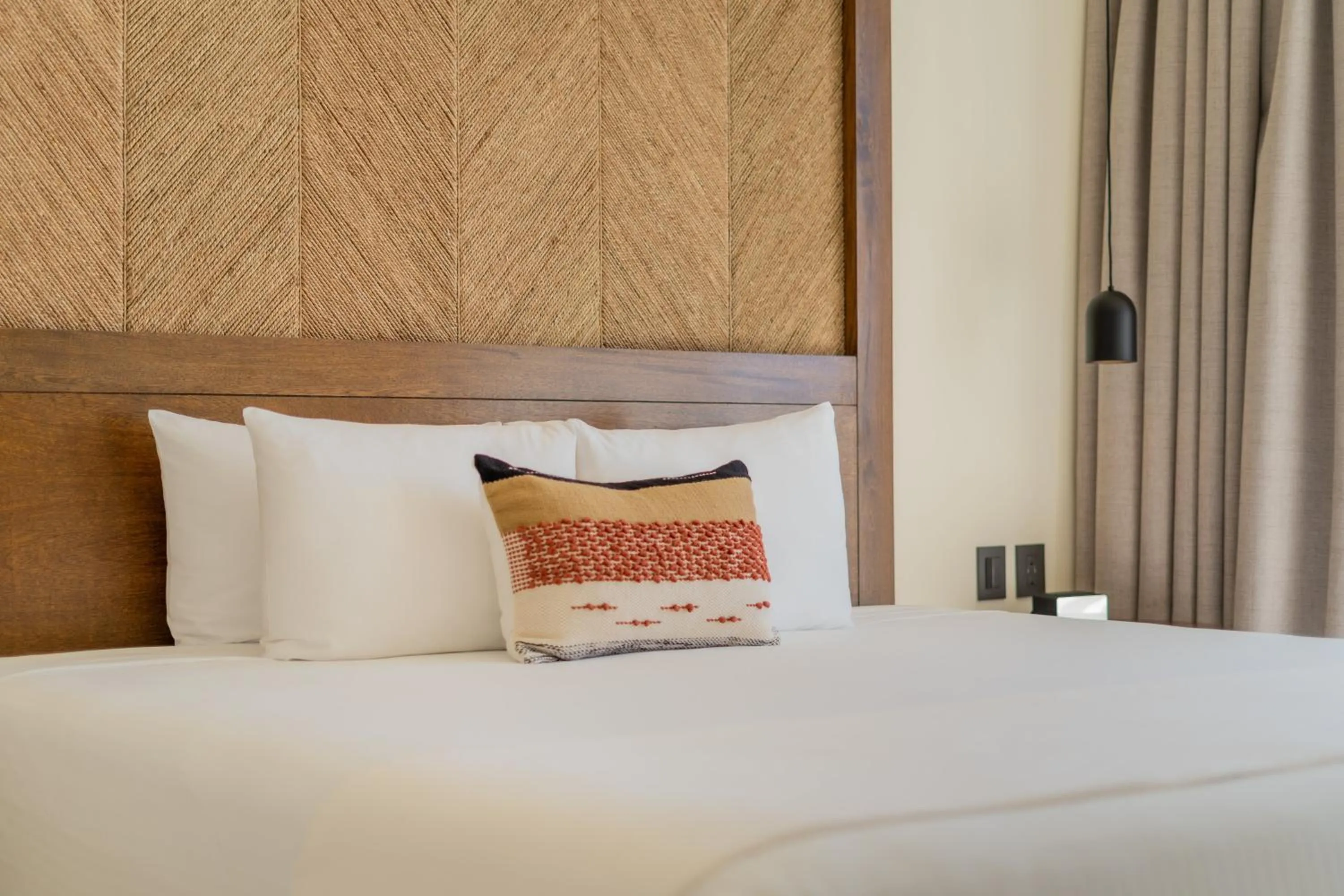 Photo of the whole room, Bed in Hotel Indigo La Paz Puerta Cortes by IHG