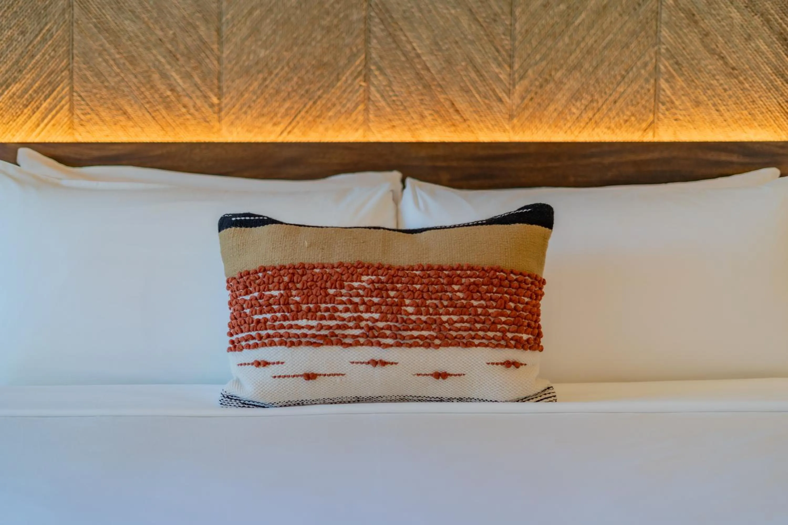 Bed in Hotel Indigo La Paz Puerta Cortes by IHG