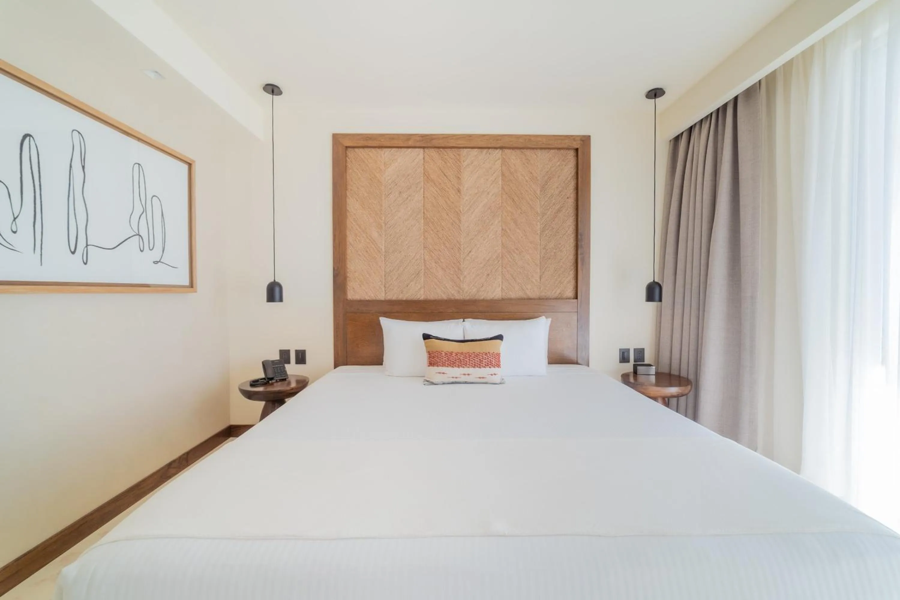 Photo of the whole room, Bed in Hotel Indigo La Paz Puerta Cortes by IHG