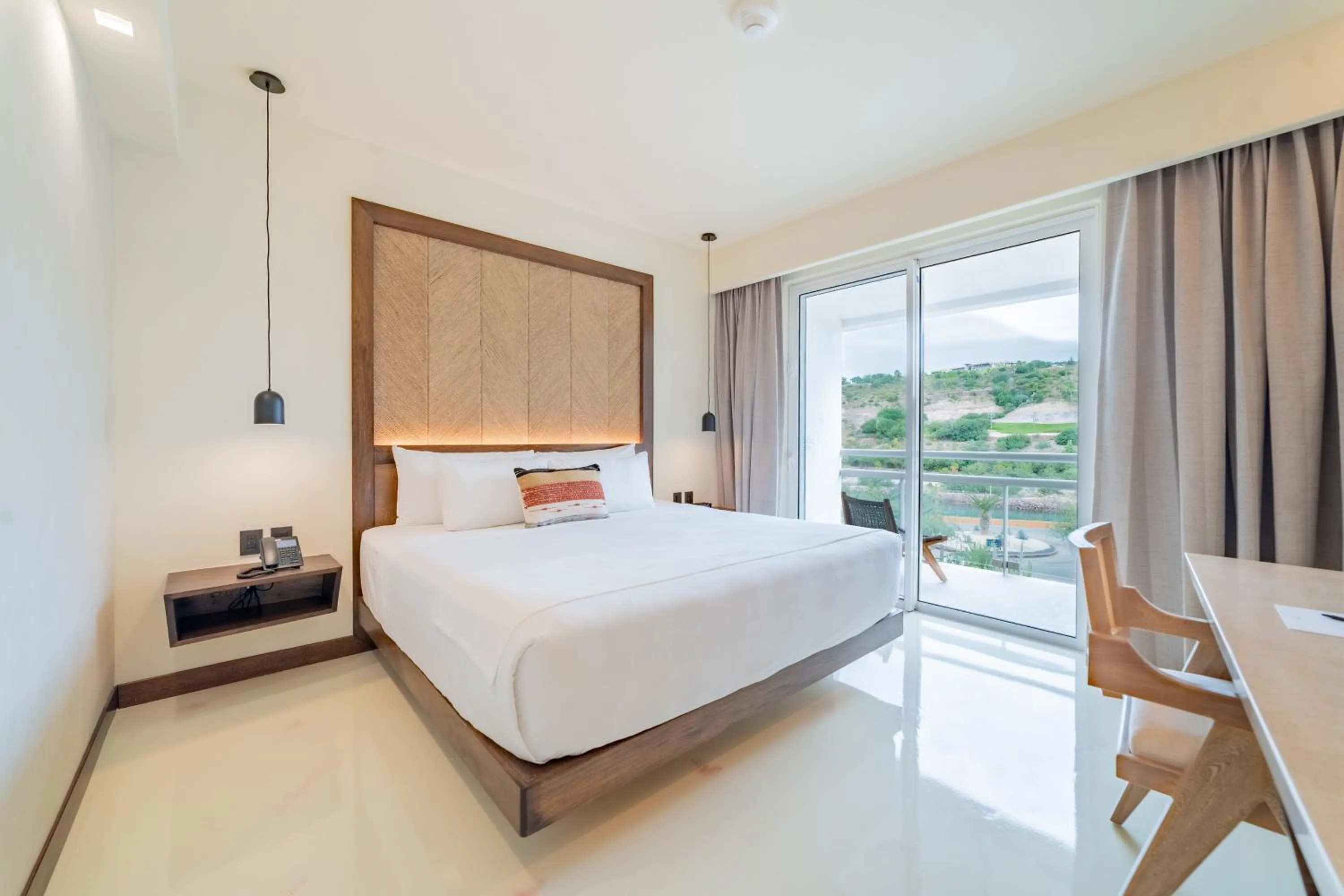 Photo of the whole room, Bed in Hotel Indigo La Paz Puerta Cortes by IHG