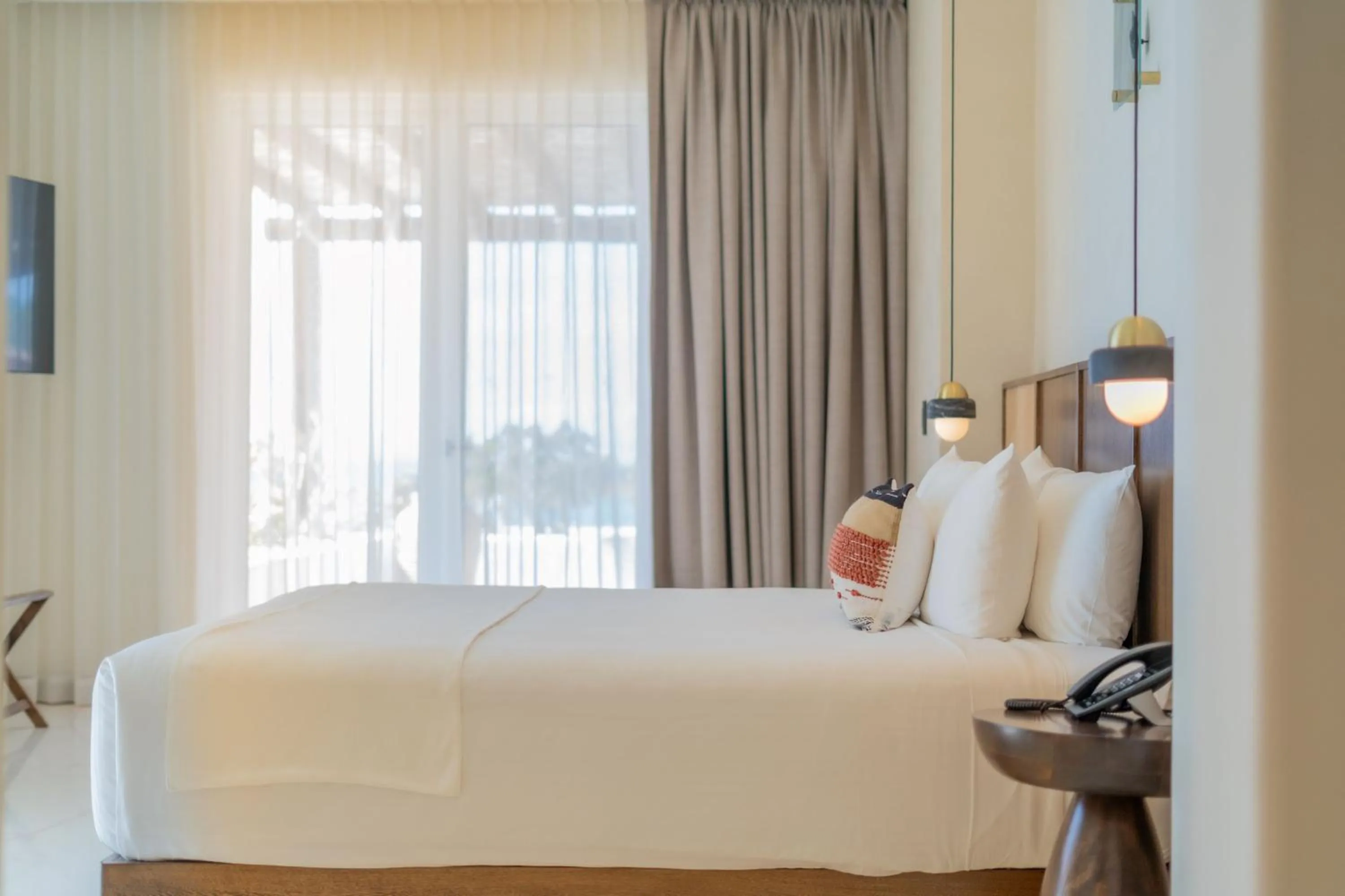 Photo of the whole room, Bed in Hotel Indigo La Paz Puerta Cortes by IHG