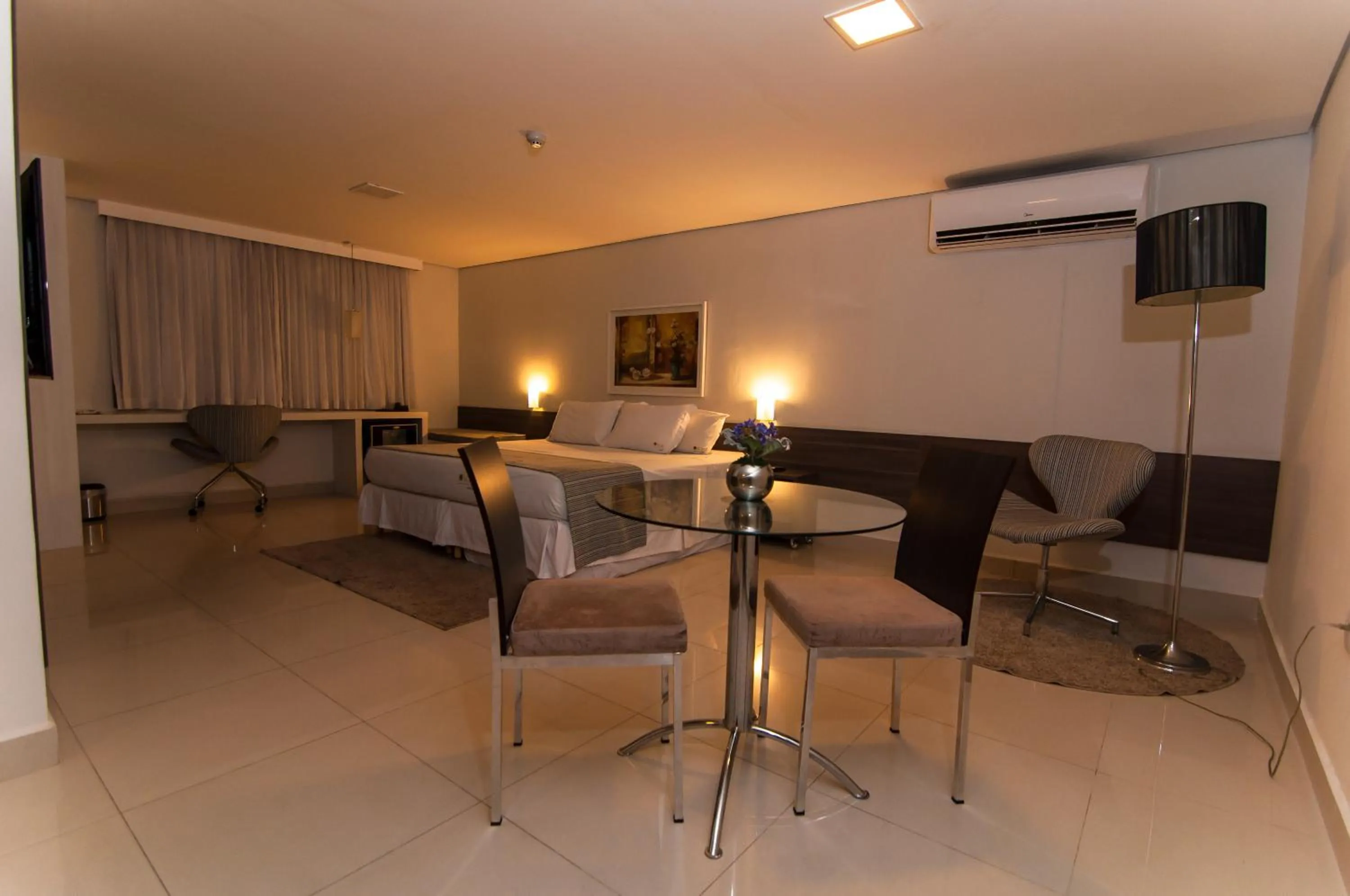 Bed in Oscar Hotel Executive