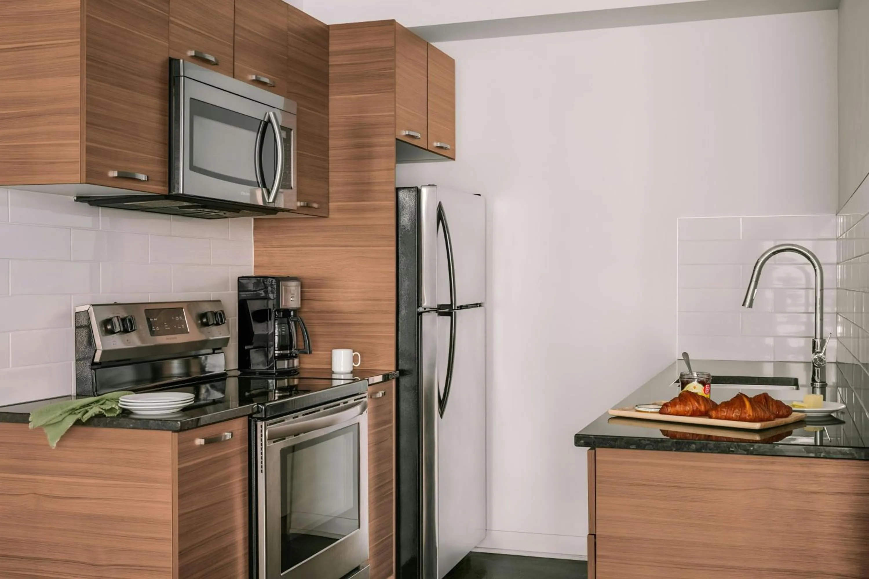 Kitchen or kitchenette in Sonder by Marriott Bonvoy Penny Lane Apartments Old Montreal