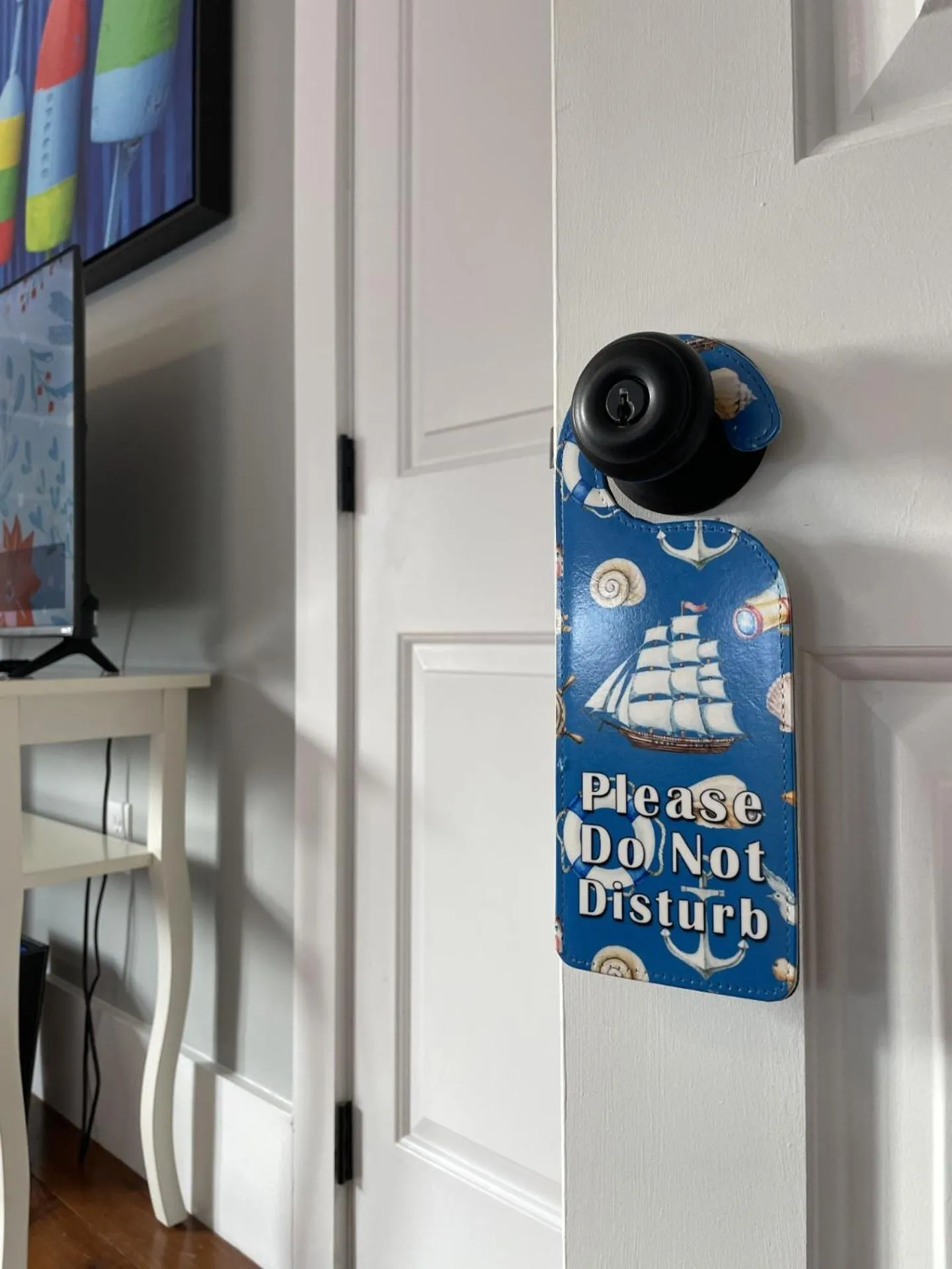 Text overlay in White Sails Inn