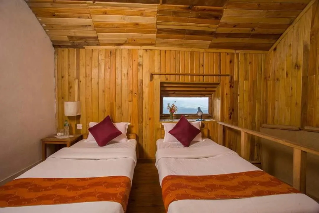 Bed in Everest Manla Resort
