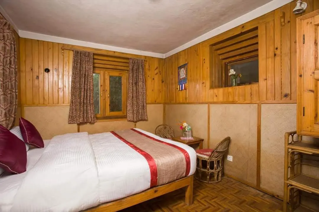 Bed in Everest Manla Resort