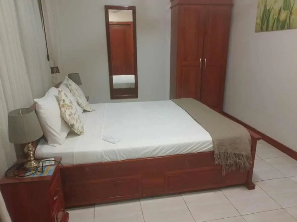 Bed in Ocean Breeze Resort