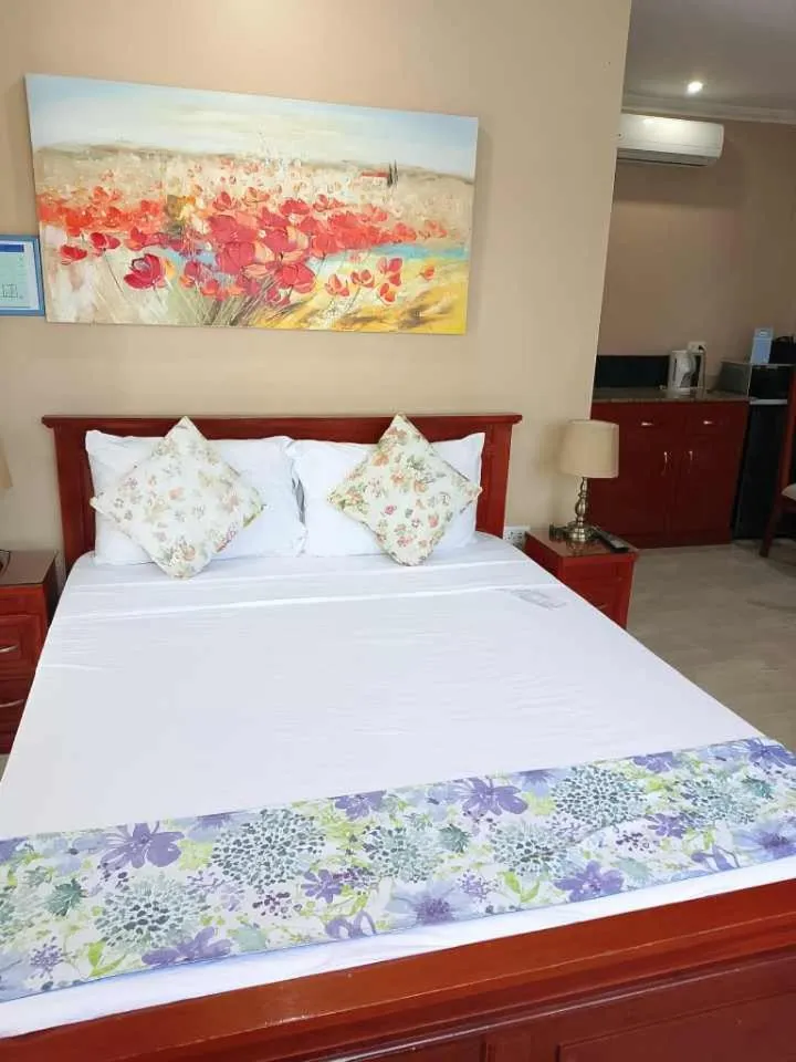 Bed in Ocean Breeze Resort