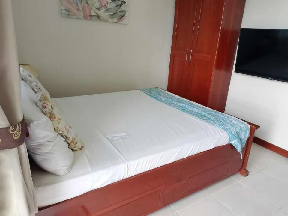 Bed in Ocean Breeze Resort